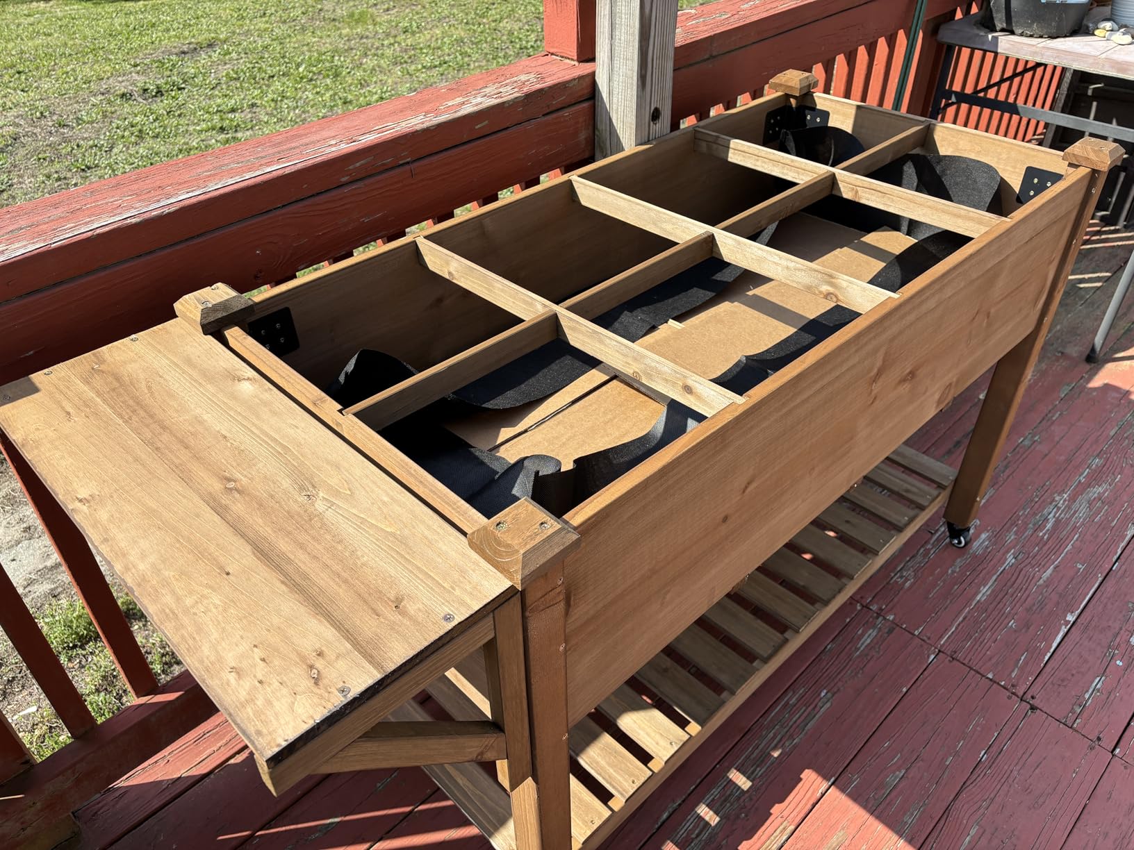 ketive Raised Garden Bed with Lockable Wheels Mobile Elevated Wood Planter,Storage Shelf, Protective Liner,55.5x24x32in (Brown) customer photo 1