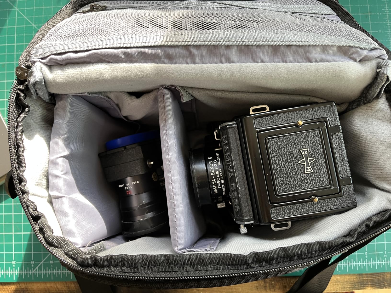 RAINSMORE Camera Bag, DSLR/SLR/Mirrorless Camera Case with Tripod Holder Waterproof Camera Sling Bag Crossbody Camera Bags for Photographers with Rain Cover for Canon/Nikon/Sony/Fuji, Black - Customer Photo 4