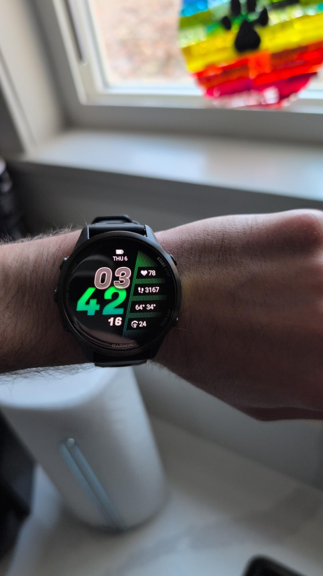 Forerunner 970, Premium GPS Running and Triathlon Smartwatch, AMOLED Display, Built-in LED Flashlight, Carbon Gray DLC Titanium with Black Case and Translucent Whitestone Band customer photo 1