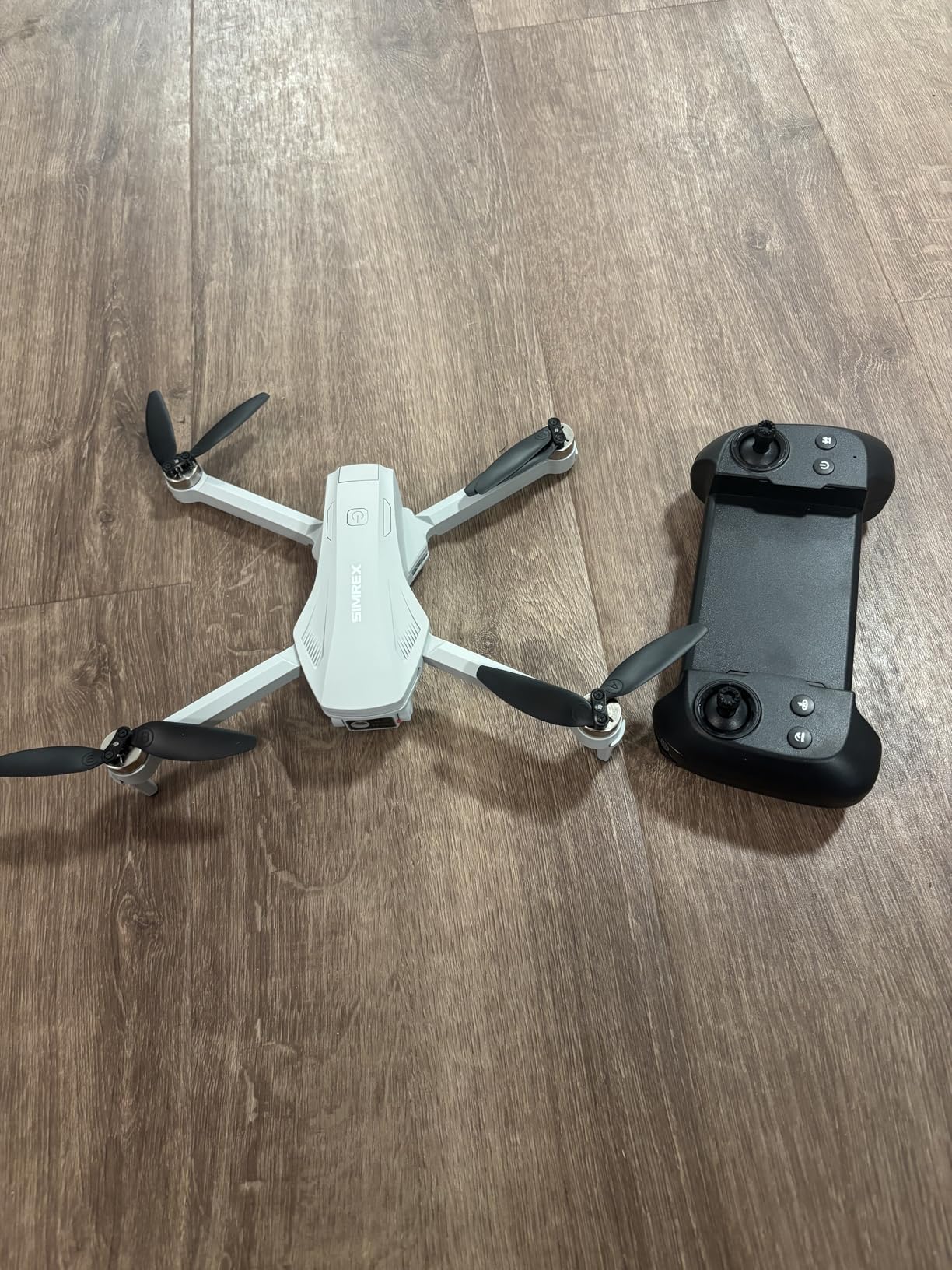 SIMREX GPS Drone with Camera for Adults 4K, Brushless Motor Drones for Beginners ,5G WiFi FPV Foldable, Auto Return , Optical Flow & Altitude Hold,Gesture Control,Follow Me, Waypoint Flight, Toys Gifts for Teen Boys (Gray) Customer Review SIMREX GPS Drone with Camera for Adults 4K, Brushless Motor Drones for Beginners ,5G WiFi FPV Foldable, Auto Return , Optical Flow & Altitude Hold,Gesture Control,Follow Me, Waypoint Flight, Toys Gifts for Teen Boys (Gray) - Customer Photo 1