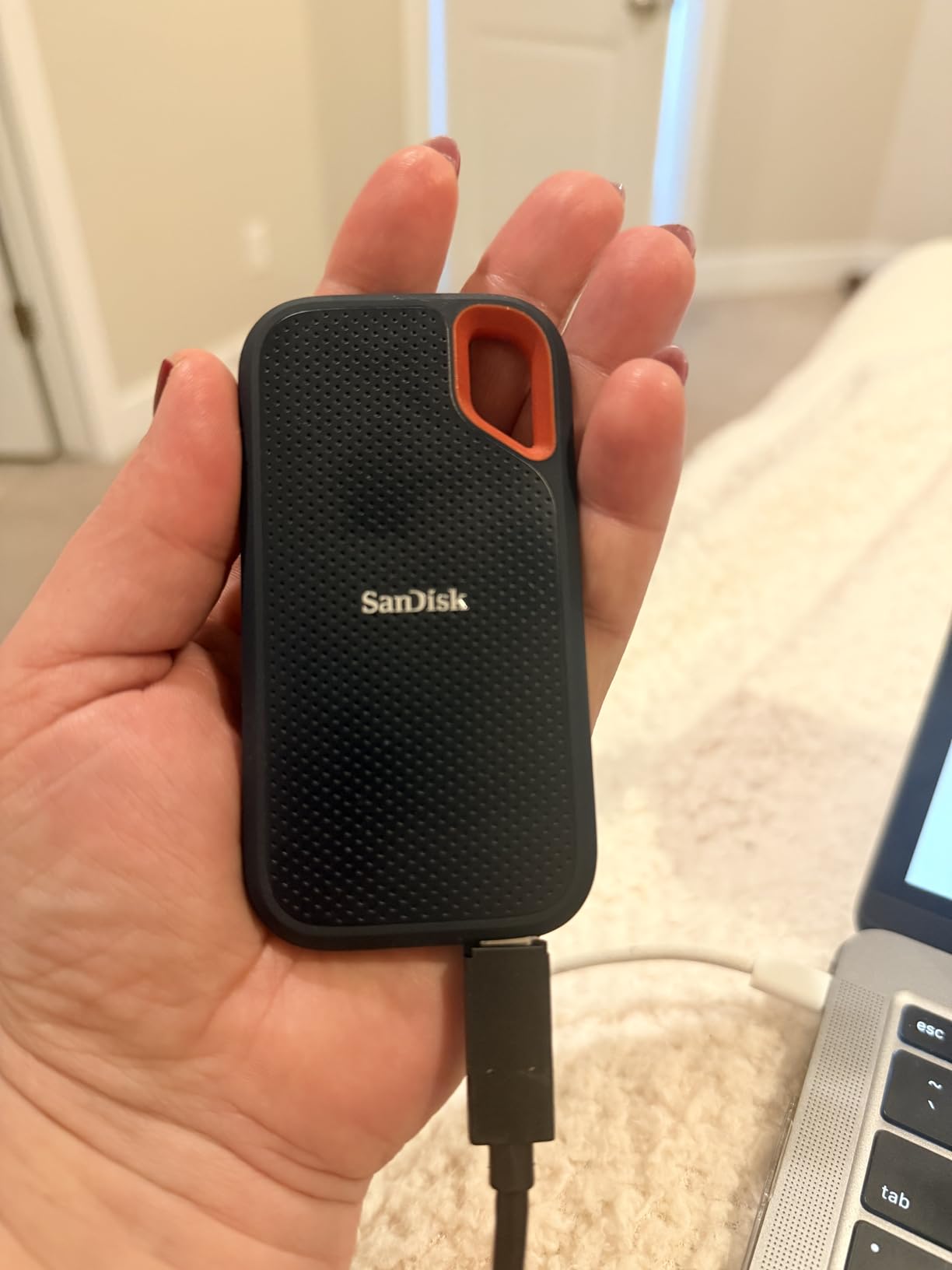 SanDisk 1TB Extreme Portable SSD - Up to 1050MB/s, USB-C, USB 3.2 Gen 2, IP65 Water and Dust Resistance, Updated Firmware - External Solid State Drive - SDSSDE61-1T00-G25 - Customer Photo 2