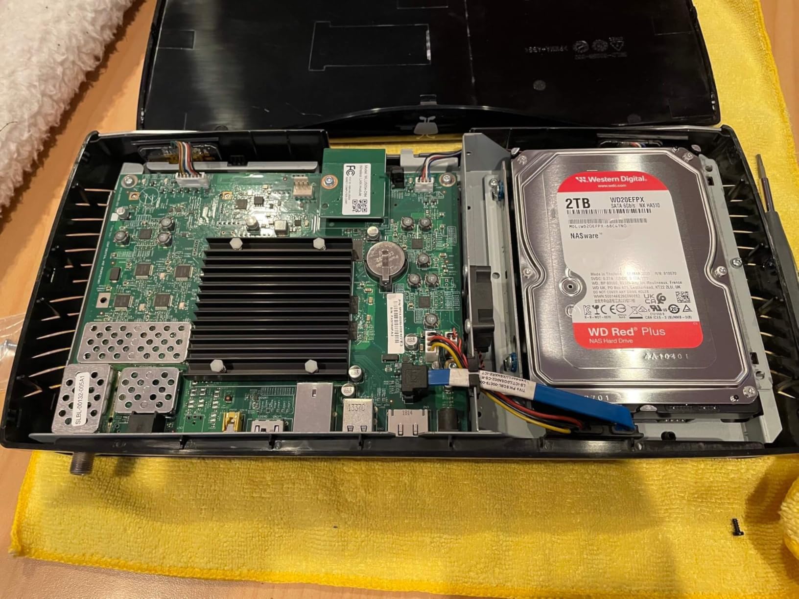 Western Digital 2TB WD Red Plus NAS Internal Hard Drive HDD - 5400 RPM, SATA 6 Gb/s, CMR, 64 MB Cache, 3.5 Inch customer photo 2