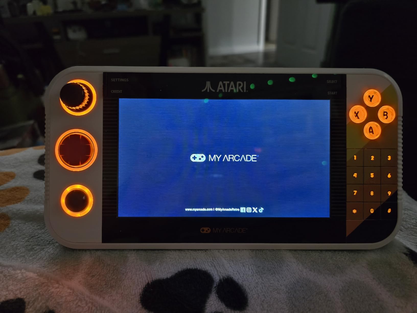 My Arcade Atari Gamestation Go: Rechargeable Battery, Over 200+ Preloaded Retro Video Games Including Pac-Man, Atari: Recharged, & Balls of Steel, Wifi, Smartglow, 7 inch Display Customer Review My Arcade Atari Gamestation Go: Rechargeable Battery, Over 200+ Preloaded Retro Video Games Including Pac-Man, Atari: Recharged, & Balls of Steel, Wifi, Smartglow, 7 inch Display - Customer Photo 1