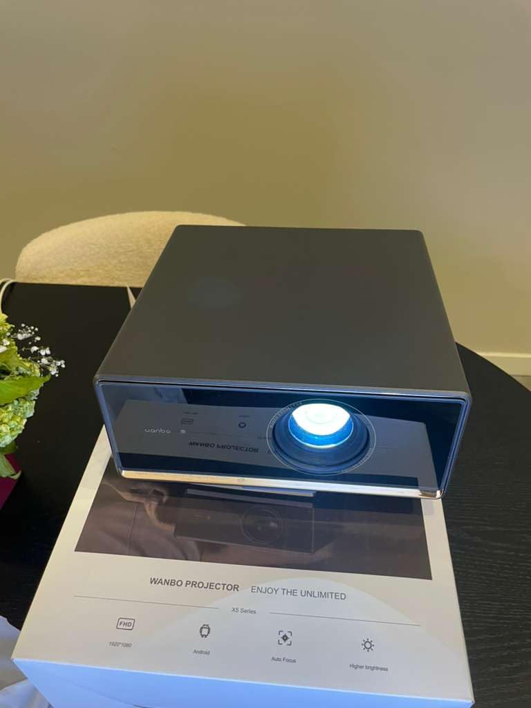 Wanbo X5 Pro Google TV Smart Projector with Wi-Fi & Bluetooth, 4K Supported, 1100 ANSI Outdoor & Home Movie Projector, Auto Focus & Keystone, HDMI 2.0, Voice Control, HDR10 (2025 Upgrade) customer photo 2