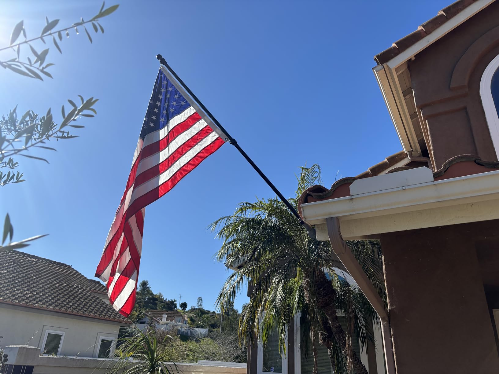 American Flag Pole Kit for House Outside - Black Metal Flagpole 6 FT with Tangle Free Design - 3x5 Embroidered US Flag, Holder Bracket, Ultra Durable Steel for Porch, Tree and More Residential customer photo 1
