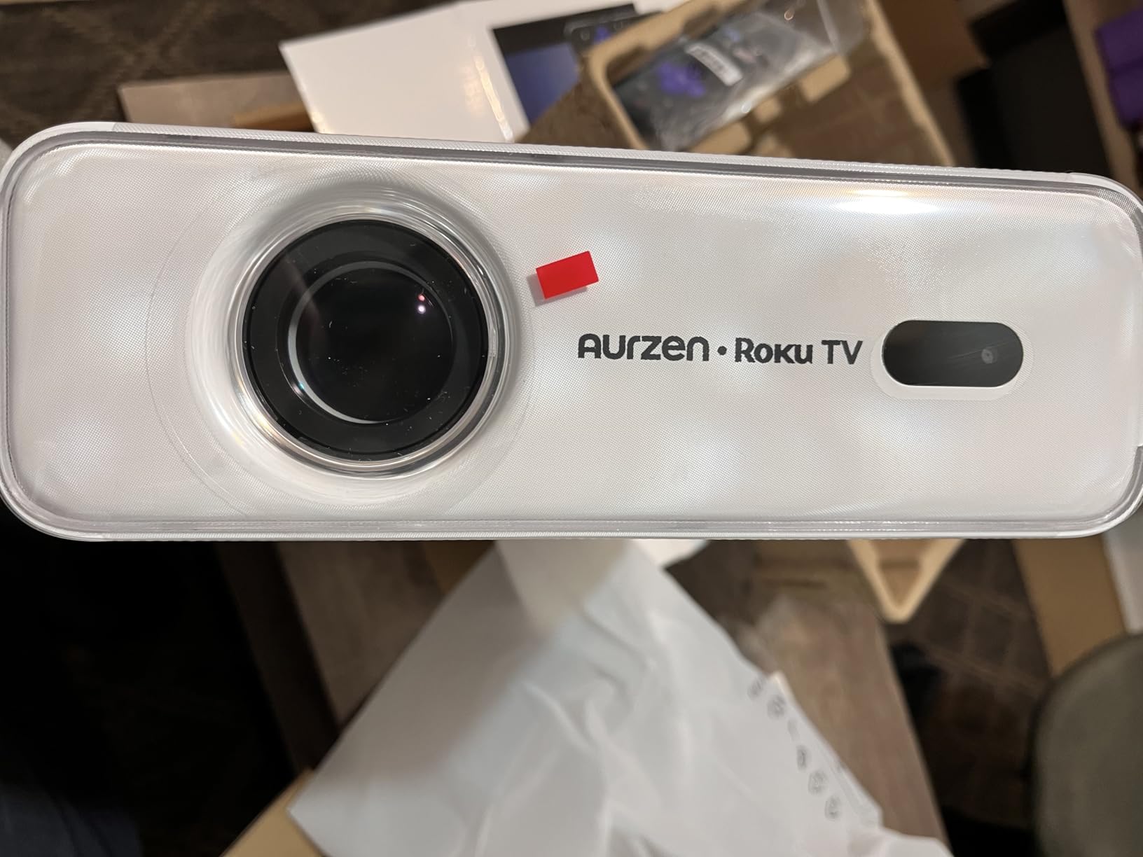 Aurzen Roku TV Smart Projector with Wifi and Bluetooth, Roku Streaming Experience Built-in, 1080P FHD, Dolby Audio, Auto Focus & Keystone, Zoom, Movie Portable Outdoor Mini Projector, White customer photo 1