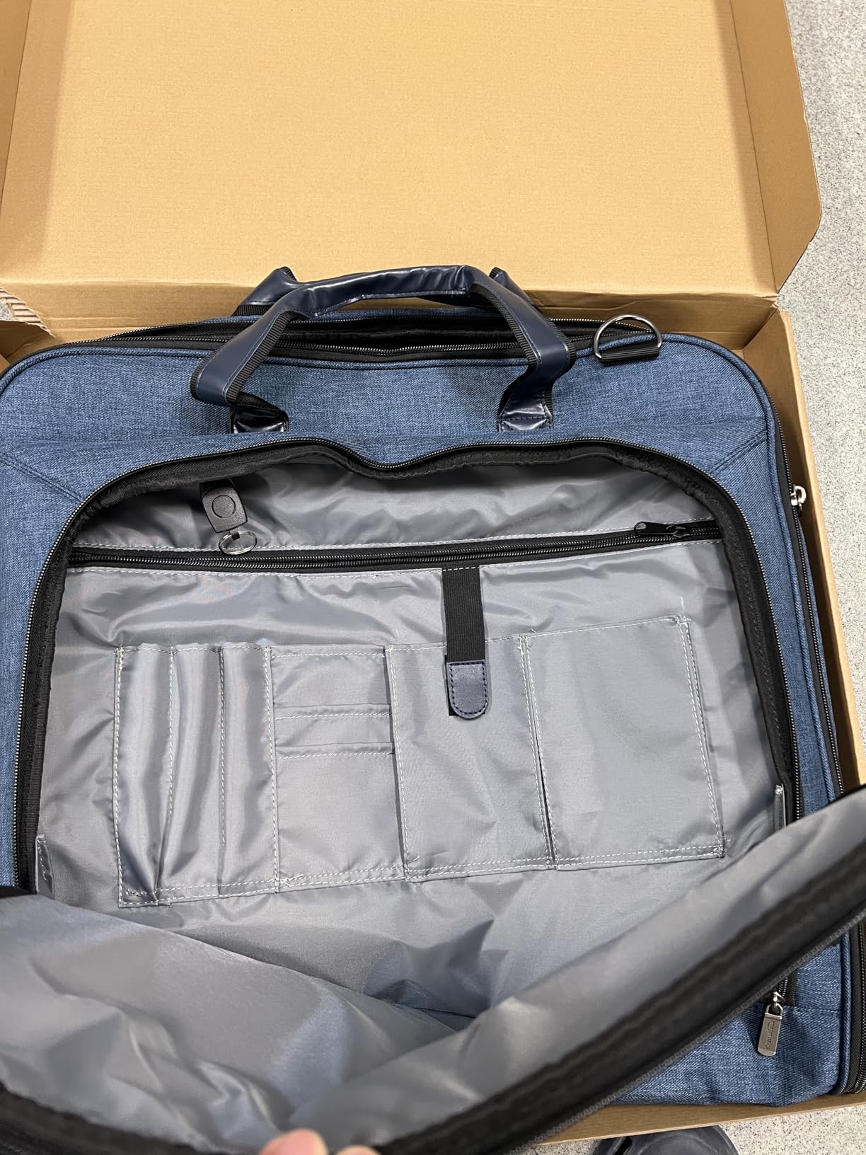 Amazon Basics Carry-On Garment Bag for Travel and Business Trips with Detachable Shoulder Strap, Hanging Suit Luggage, Wrinkle Free Cover for Suits Dresses Coats customer photo 2