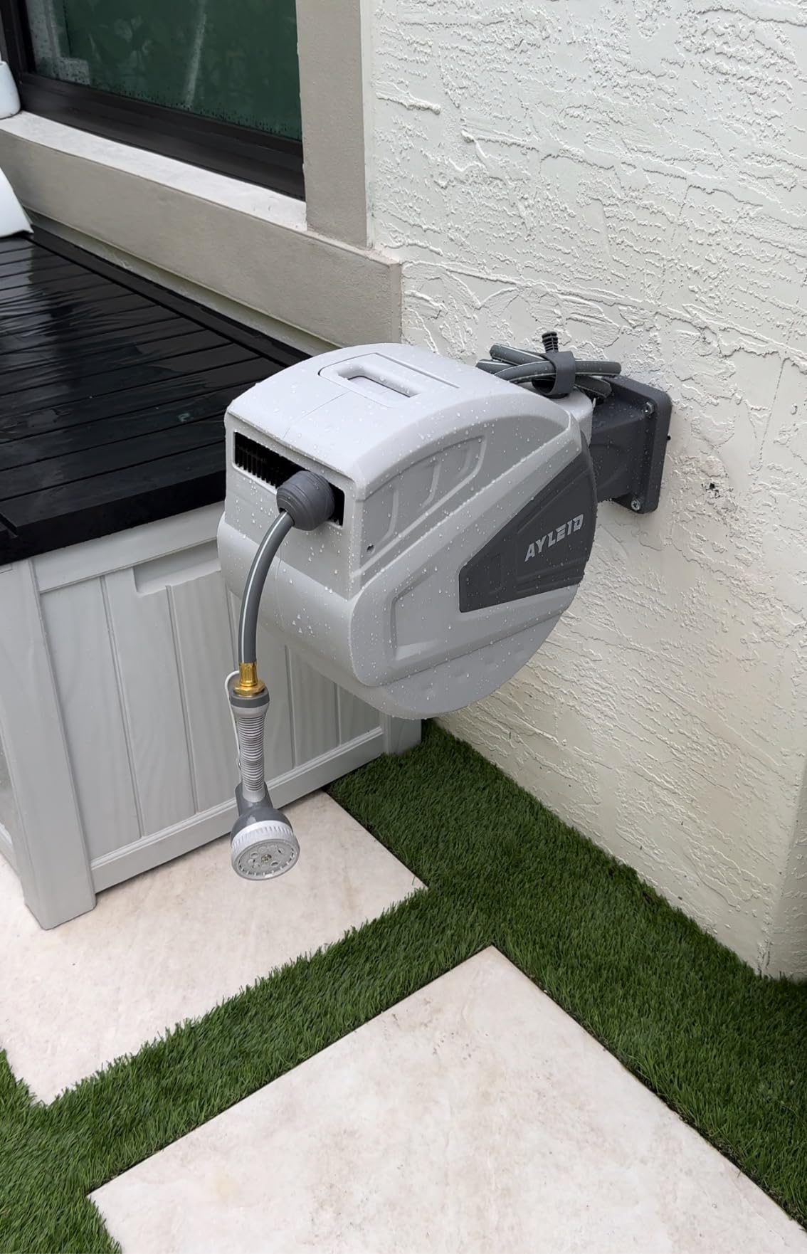 Ayleid Retractable Garden Hose Reel, 1/2 in x 100 ft Wall Mounted Hose Reel, with 9-Function Sprayer Nozzle, Any Length Lock/Slow Return System/Wall Mounted/180°Swivel Bracket (Gray) customer photo 2