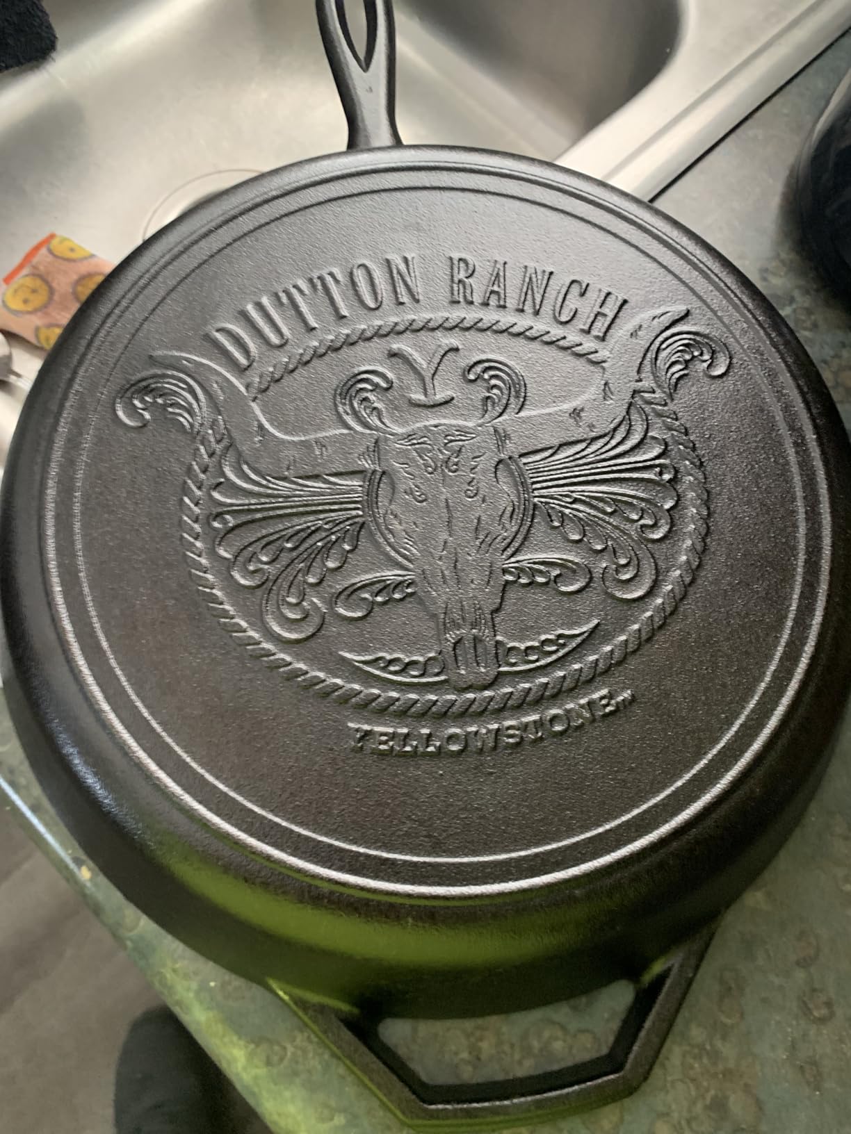 Lodge Pre-Seasoned Yellowstone Stamped Cast Iron Cookware - Signature Teardrop Handle - Use in the Oven, on the Stove, on the Grill, or Over a Campfire - 12 Inch Logo Skillet customer photo 2