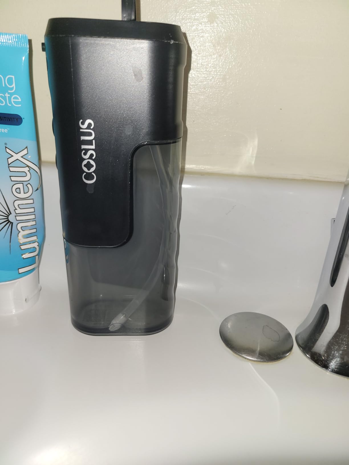 COSLUS T40 Mini Water Flosser for Travel: Portable Compact Design, Cordless Oral Irrigator with 4 Modes, Removable Tank, IPX7 Waterproof for Braces, Orthodontic, Sensitive Teeth On-The-Go Use, Black customer photo 1