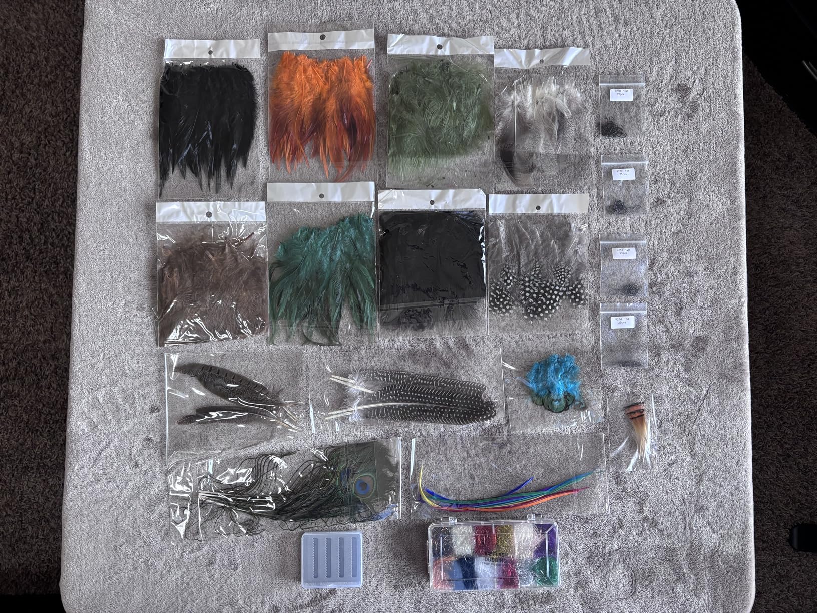 EUPHENG Fly Tying Materials Kit 14 Types of Feathers, Dubbing & Hooks, UV Dyed Hackle Feathers Starter kit for Tying Fly Fishing Flies, Perfect for Tails & Wings, Easy to Tie Fly Tying Kit customer photo 1