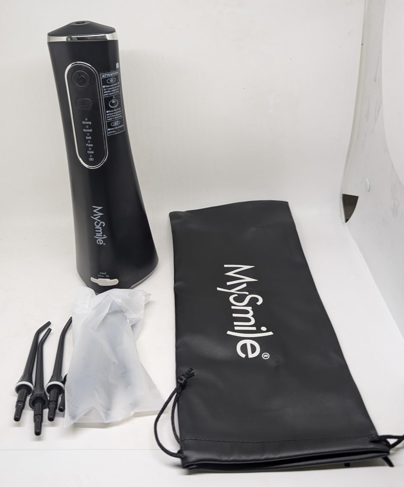 MySmile LP211 Cordless Water Flossers, Portable Rechargeable Oral Irrigator for Teeth Cleaning, 5 Cleaning Modes, IPX7 Waterproof, 8 Replacement Tips and a Storage Pouch (Midnight Black) customer photo 2