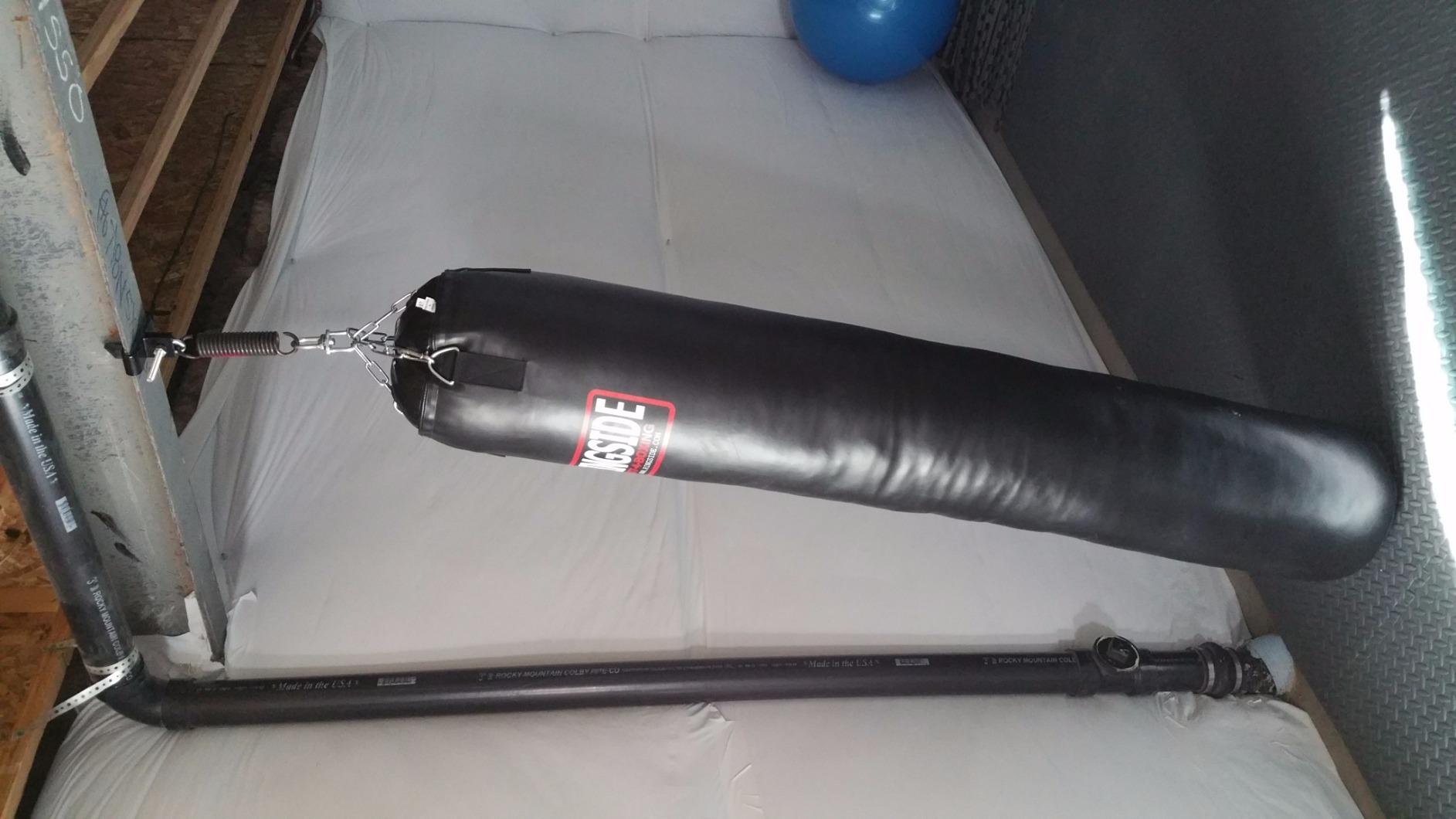 Ringside 100-Pound Muay Thai Heavy Bag, Sturdy Powerhide Punching Bag for Boxing, MMA, Muay Thai, and Kickboxing Training and Workout, Includes Chain and Swivel, Black, 72