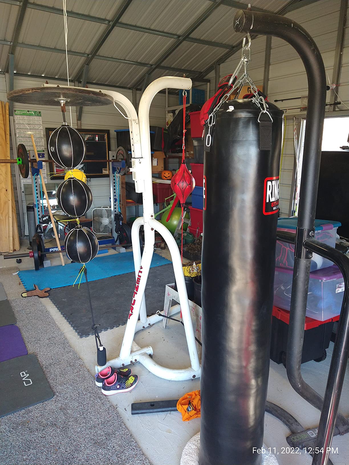 Ringside 100-Pound Muay Thai Heavy Bag, Sturdy Powerhide Punching Bag for Boxing, MMA, Muay Thai, and Kickboxing Training and Workout, Includes Chain and Swivel, Black, 72