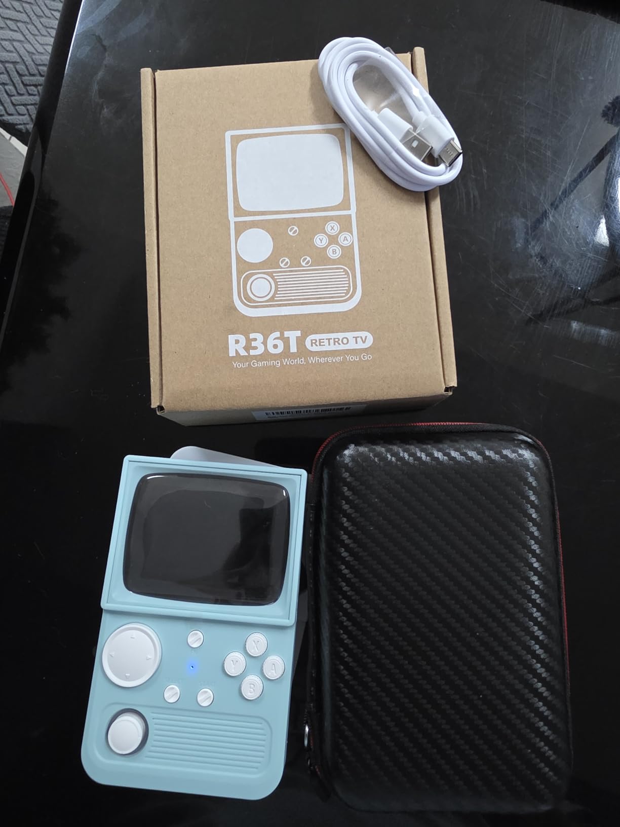 R36 Max Retro Gaming Console, Retro Handheld Console 4.0'' Screen Linux System, 64G TF Card, 4000mAh Rechargeable Portable Pocket Arcade, Transparent Blue customer photo 1