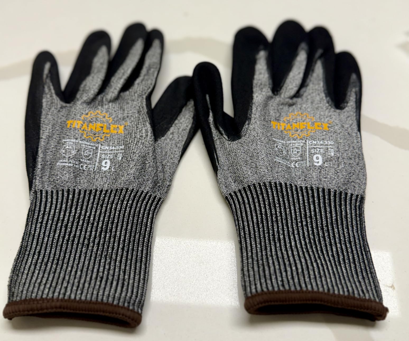 TitanFlex ANSI A5 Cut Resistant Work Gloves, Sandy Nitrile Anti-Slip Grip, 3D Comfort Fit, Breathable & Durable, Touchscreen Compatible, Machine Washable, Black, 1 Pair (L) customer photo 1