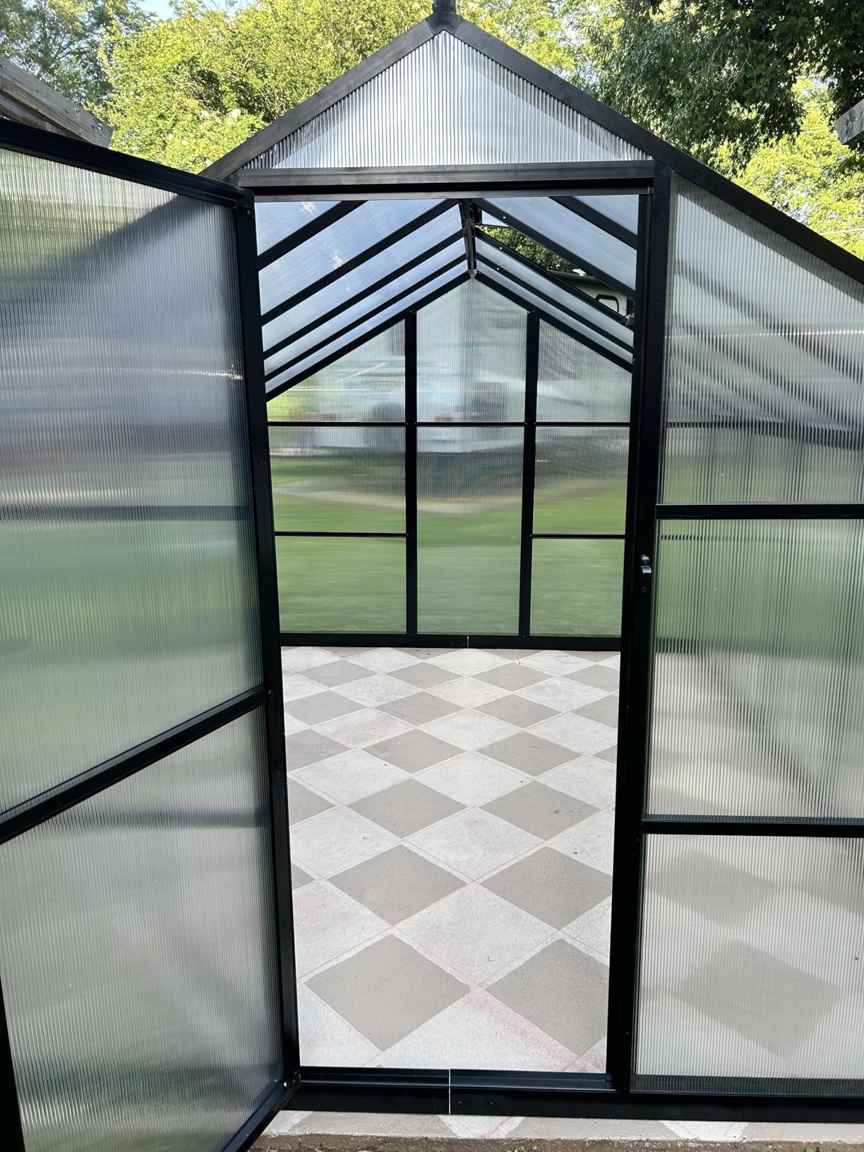 6x10 FT Greenhouse for Outdoors, Polycarbonate Greenhouse with Roof Vent, Ground Nails, Lockable Push Door, Aluminum Large Walk-in Green House for Outside Garden Backyard, Patio, Lawn, Black customer photo 1