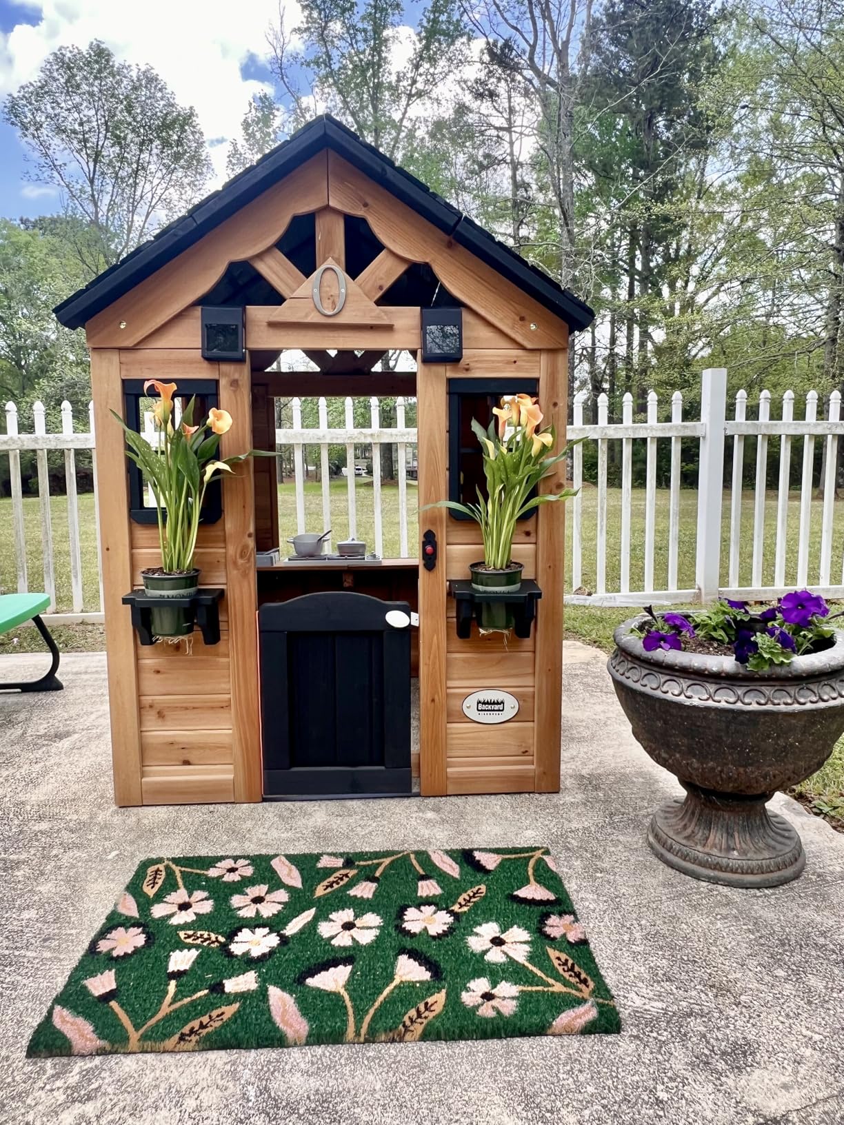 Backyard Discovery Sweetwater Cedar Wooden Kids Playhouse Cottage with Play Kitchen, Snack Bar, Half Door, Toy Phone, Windows, Flowerpot Holders, and Working Doorbell for Outdoor Imaginative Play customer photo 1