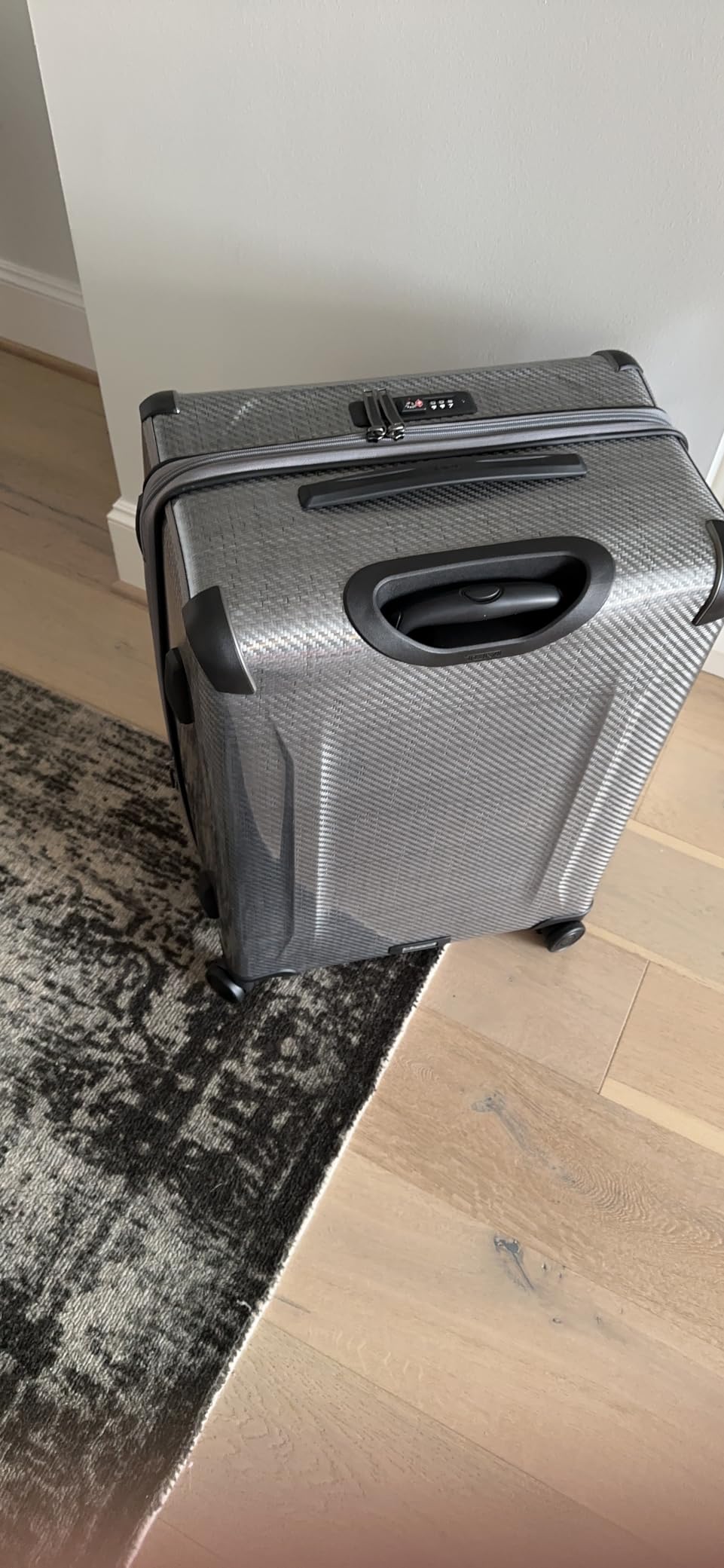 Tegra-Lite 4 Wheel Luggage - Highly Durable Suitcase, Flexible Shell, Sleek and Lightweight Men's and Women's Expandable Rolling Bag - International, Black Graphite customer photo 2
