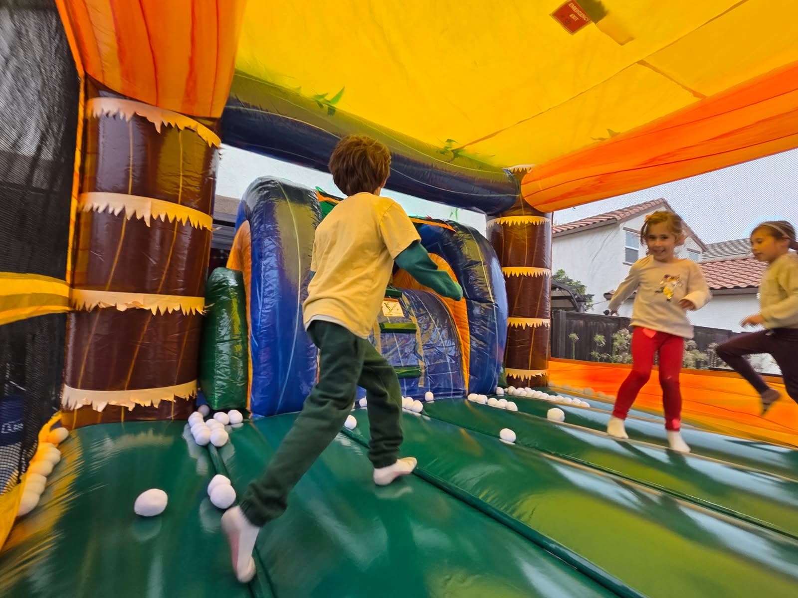 XJUMP 12.6'x26'x13' Tropical Castle Bounce House with Slide- Heavy Duty 15oz PVC Vinyl, with Basketball Hoop and Blower, Indoor and Outdoor Rental Grade Jump House with Slide for Kids & Adults customer photo 1