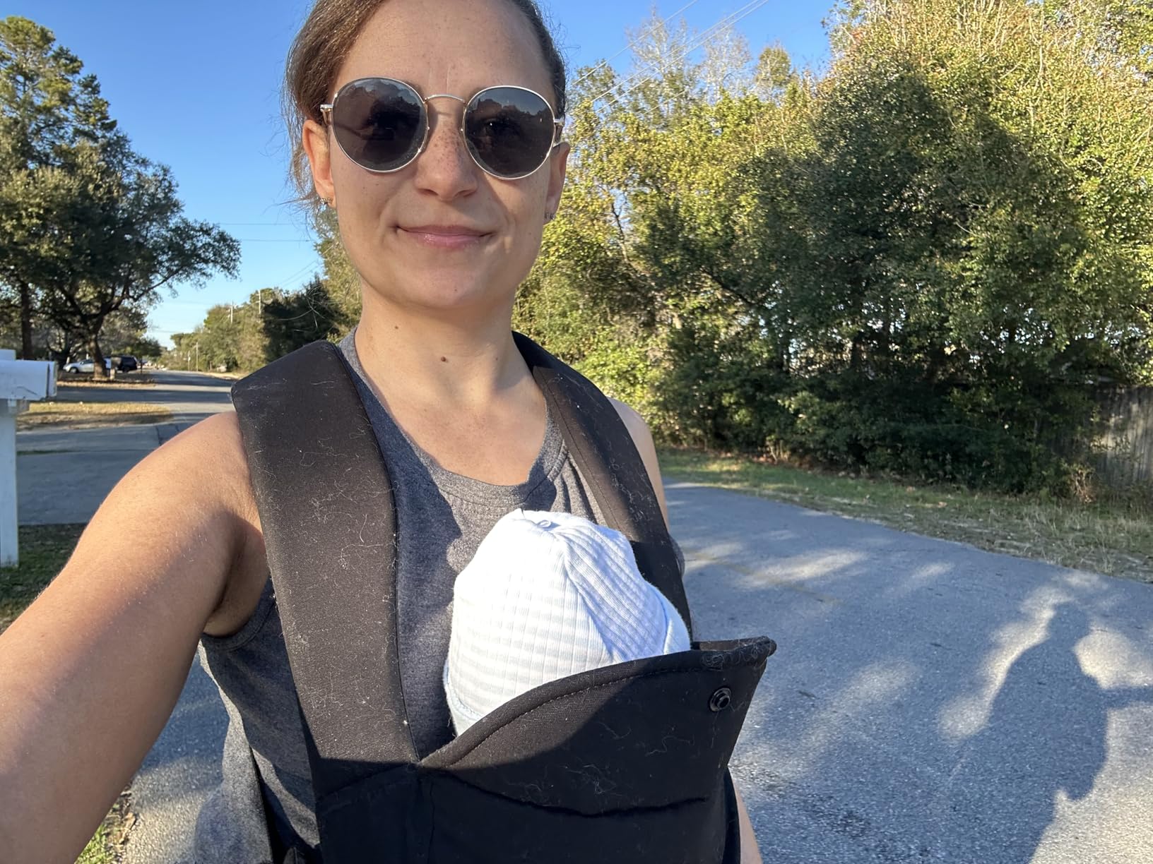 Momcozy Newborn Carrier WeeSnug - Lightweight and Cozy Comfort for 7-25 lbs, Ergonomic Cross-Back Support, Effortless to Put On, Hands-Free Baby Carrier with Lumbar Support, Black customer photo 1