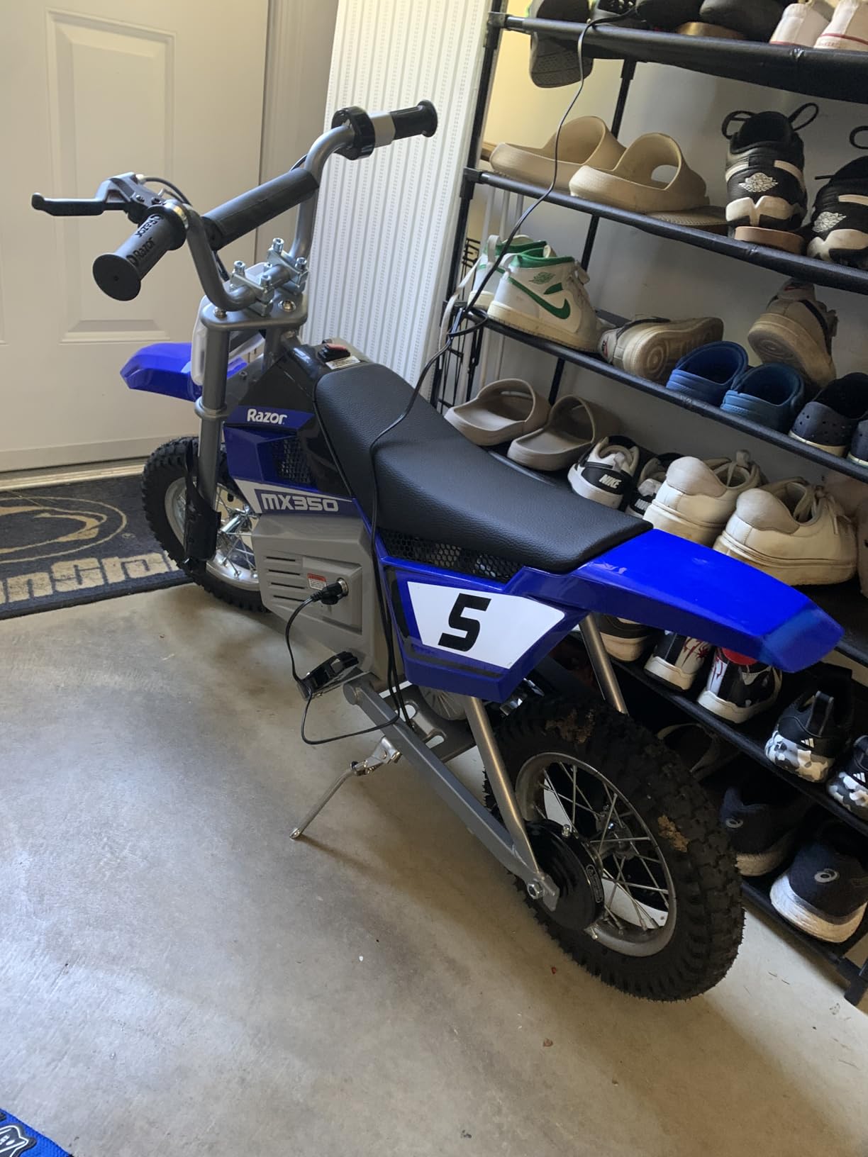 Razor MX350 Dirt Rocket Electric Bike for Kids Ages 8+, 140 lb Max Weight, Blue - 24V Battery, Up to 14 Mph, 30-Min Ride Time on High Speed, Twist-Grip Throttle, Spoked Wheels w/ 12