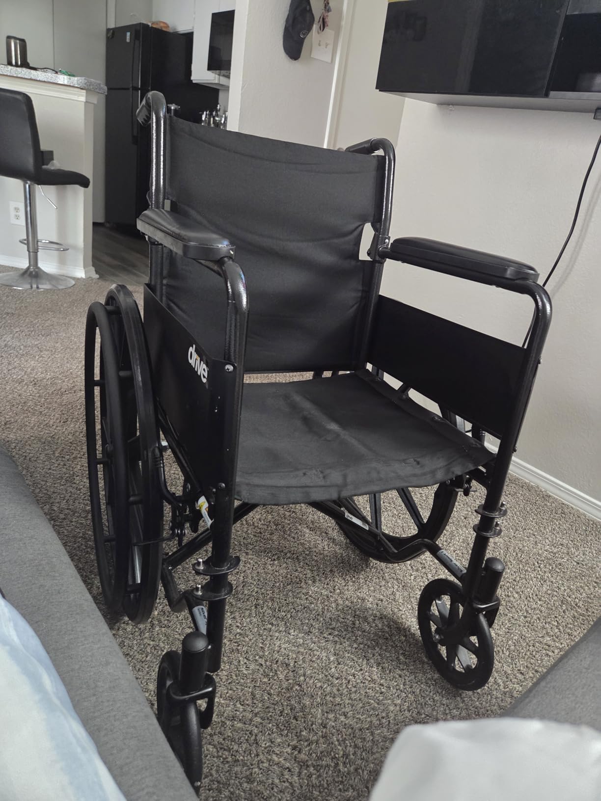 Drive Medical Silver Sport 1 Folding Transport Wheelchair - Lightweight Mobility Support - Full Armrests - Removable Swing-Away Footrests - Durable Steel Construction - Compact Folding Frame - Black customer photo 1