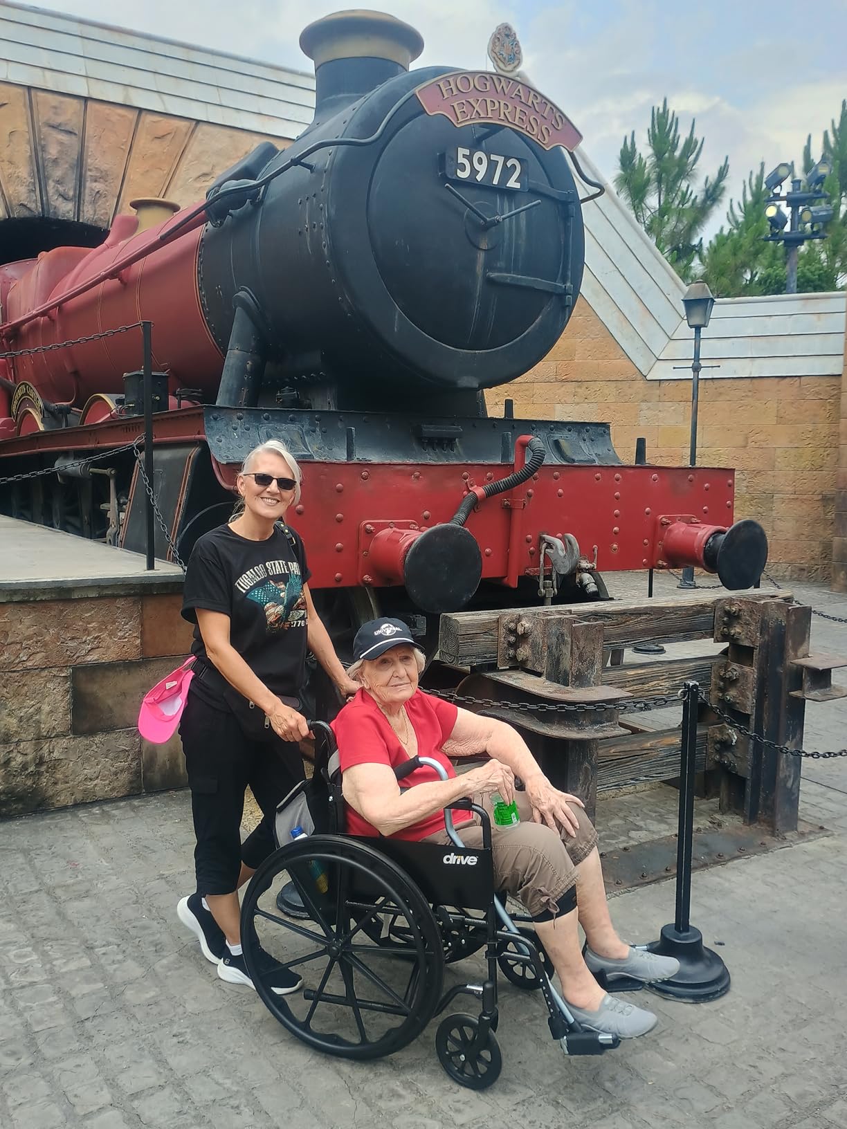 Drive Medical Silver Sport 1 Folding Transport Wheelchair - Lightweight Mobility Support - Full Armrests - Removable Swing-Away Footrests - Durable Steel Construction - Compact Folding Frame - Black customer photo 2