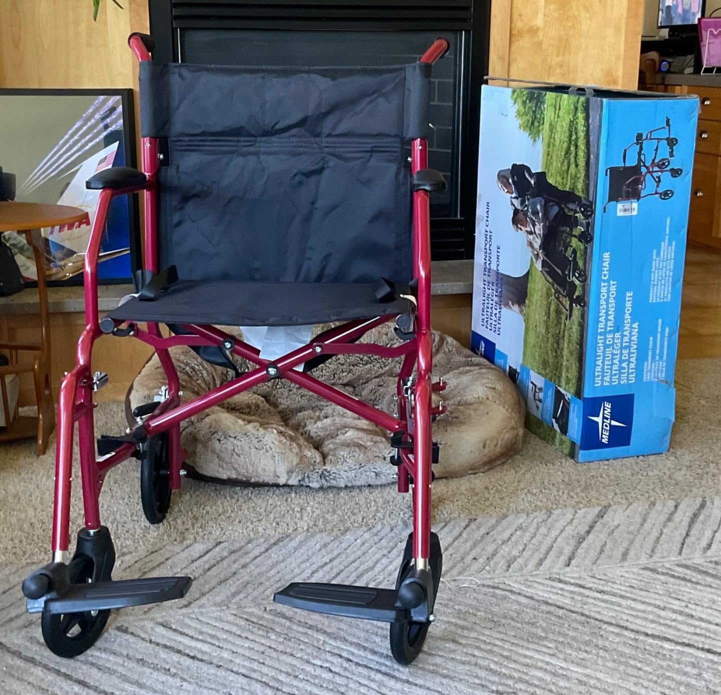 Medline Ultra Lightweight Transport Wheelchair for Adults, Foldable, 19-Inch Seat Width, Red Frame, Black Upholstery customer photo 1