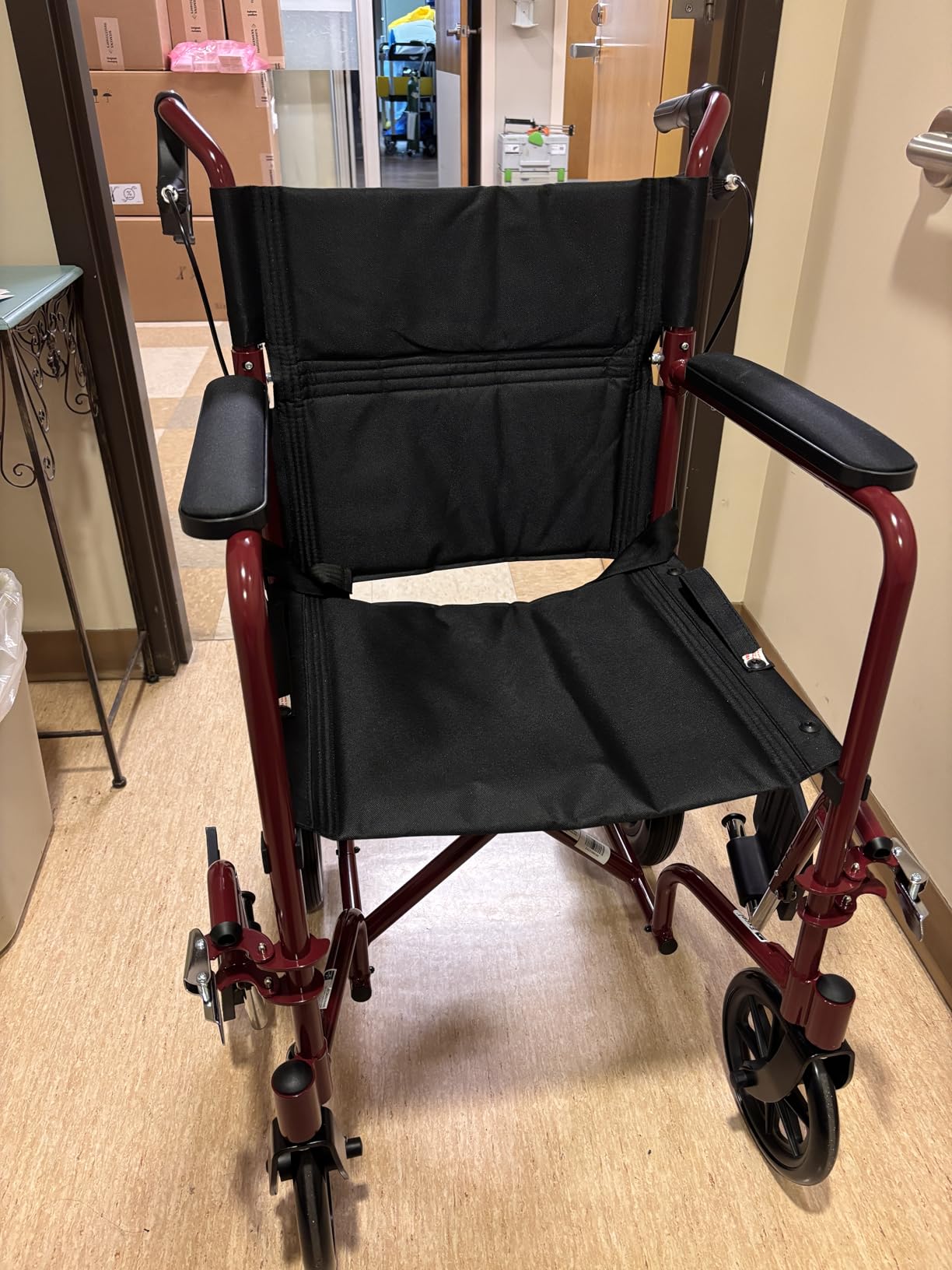 Medline Lightweight Foldable Transport Wheelchair with Handbrakes and 12-Inch Wheels, Red Frame, Black Upholstery customer photo 1