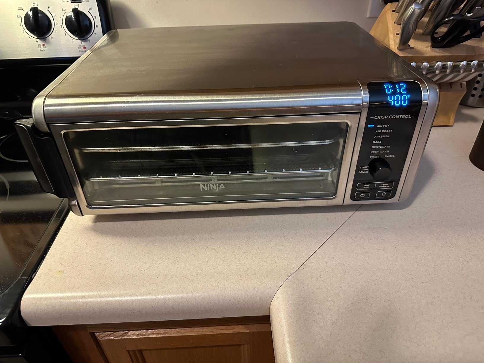 Ninja Digital Air Fryer & Toaster Oven | 8-in-1 Functionality | Flip-Up Design | XL Capacity | Air Fry Basket, Sheet Pan, Wire Rack & Crumb Tray | 1800 Watt | Silver | SP101 customer photo 2