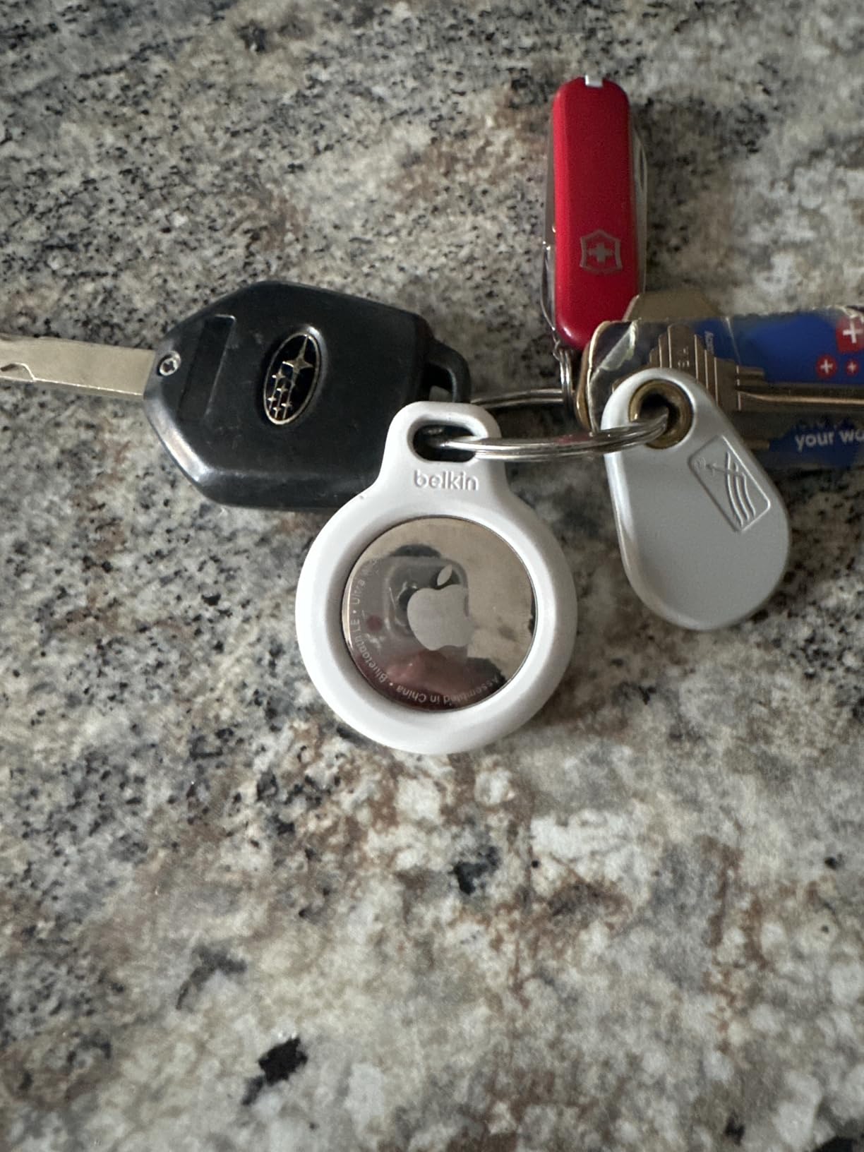 Belkin Apple AirTag Secure Holder with Key Ring - Durable, Scratch-Resistant Case with Open Face & Raised Edges - Protective AirTag Keychain Holder Accessory for Keys, Pets, Luggage, & More - White customer photo 1
