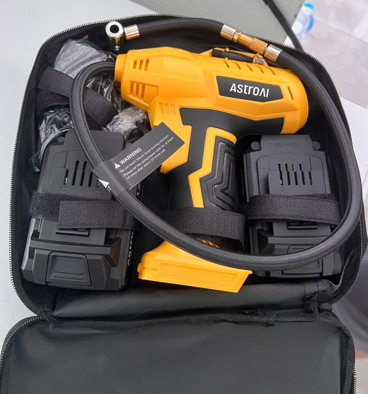 AstroAI Cordless Tire Inflator Air Compressor 20V Rechargeable Battery Powered 160PSI Portable Air Pump with 12V Car Power Adapter Digital Pressure Gauge for Cars Motorcycles (C2) Yellow customer photo 1