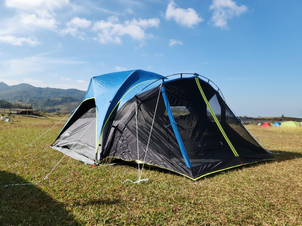 Coleman Carlsbad 4 Person Dark Room Dome Camping Tent with Screen Room, E Ports, Side Windows, and WeatherTec System, Teal Blue/Black customer photo 1