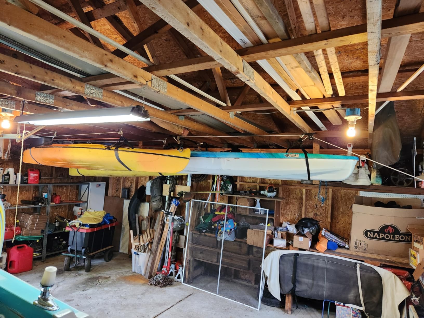 StoreYourBoard Kayak and Canoe Ceiling Hoist - Overhead Garage Storage Rack for Kayaks, Canoes, and Paddle Gear - Heavy Duty Pulley System Indoor Ceiling Mount customer photo 1