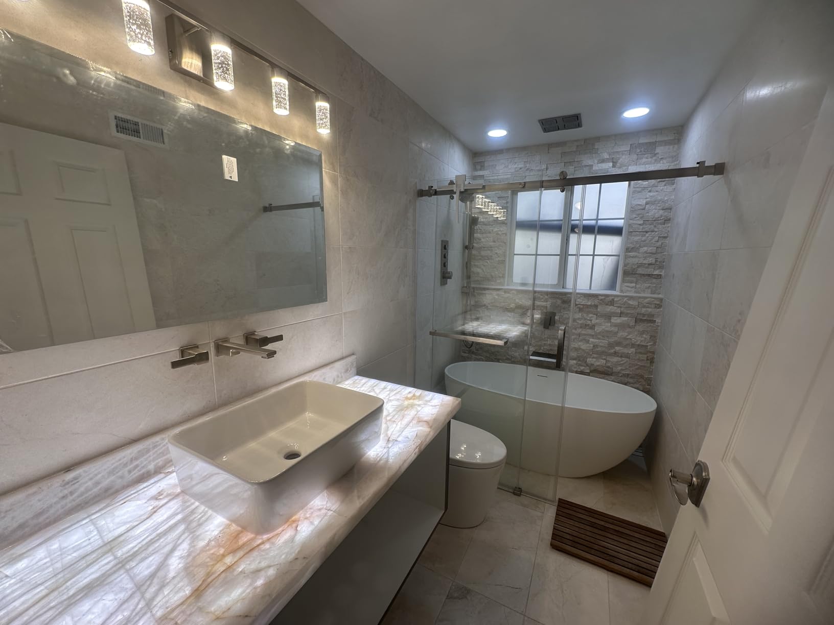 61'' Resin Stone Soaking Bathtub Oval Solid Surface Freestanding Soaking Bathtubs Matte White Soaking Tub with Overflow and Pop up Drain - White customer photo 1