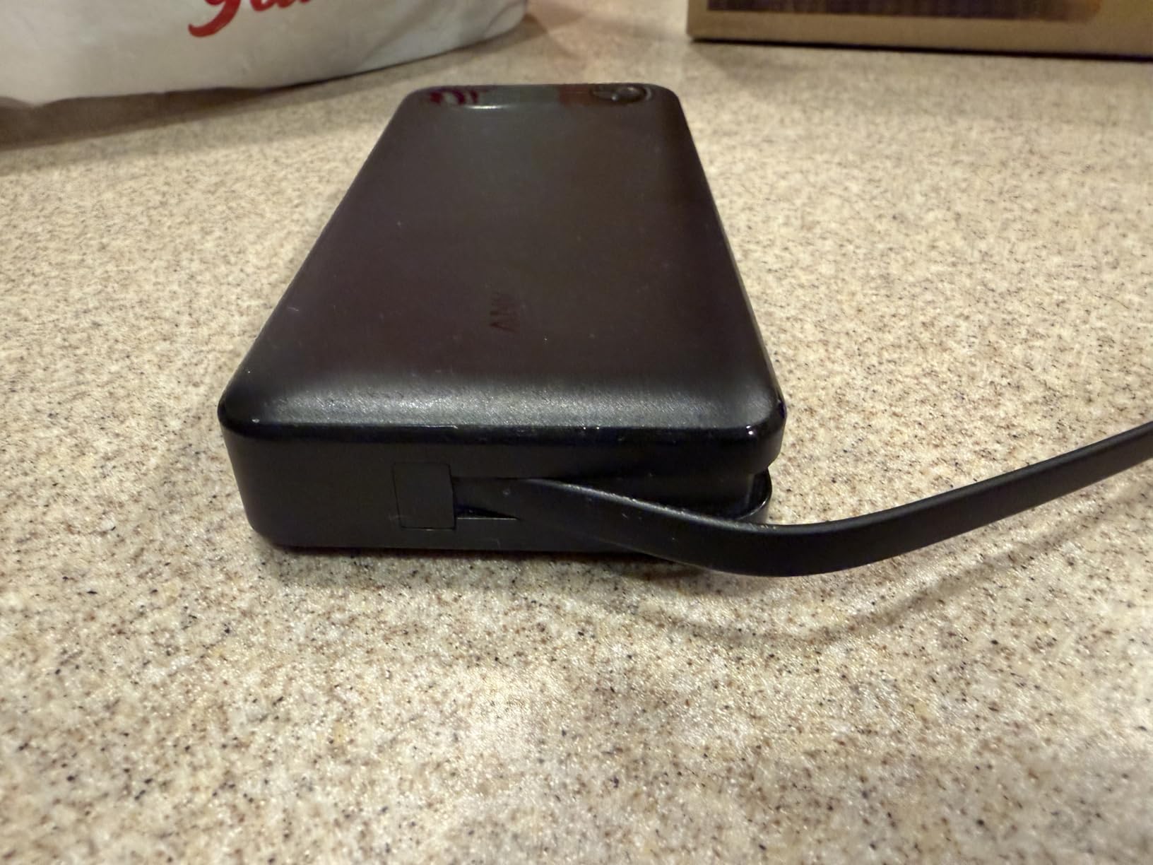 Anker Power Bank, 20,000mAh Travel Essential Portable Charger with Built-in USB-C Cable, 3-Port 87W Max Fast Charging Battery Pack, for MacBook, iPhone 16/15 Series, Samsung, Switch, and More customer photo 1