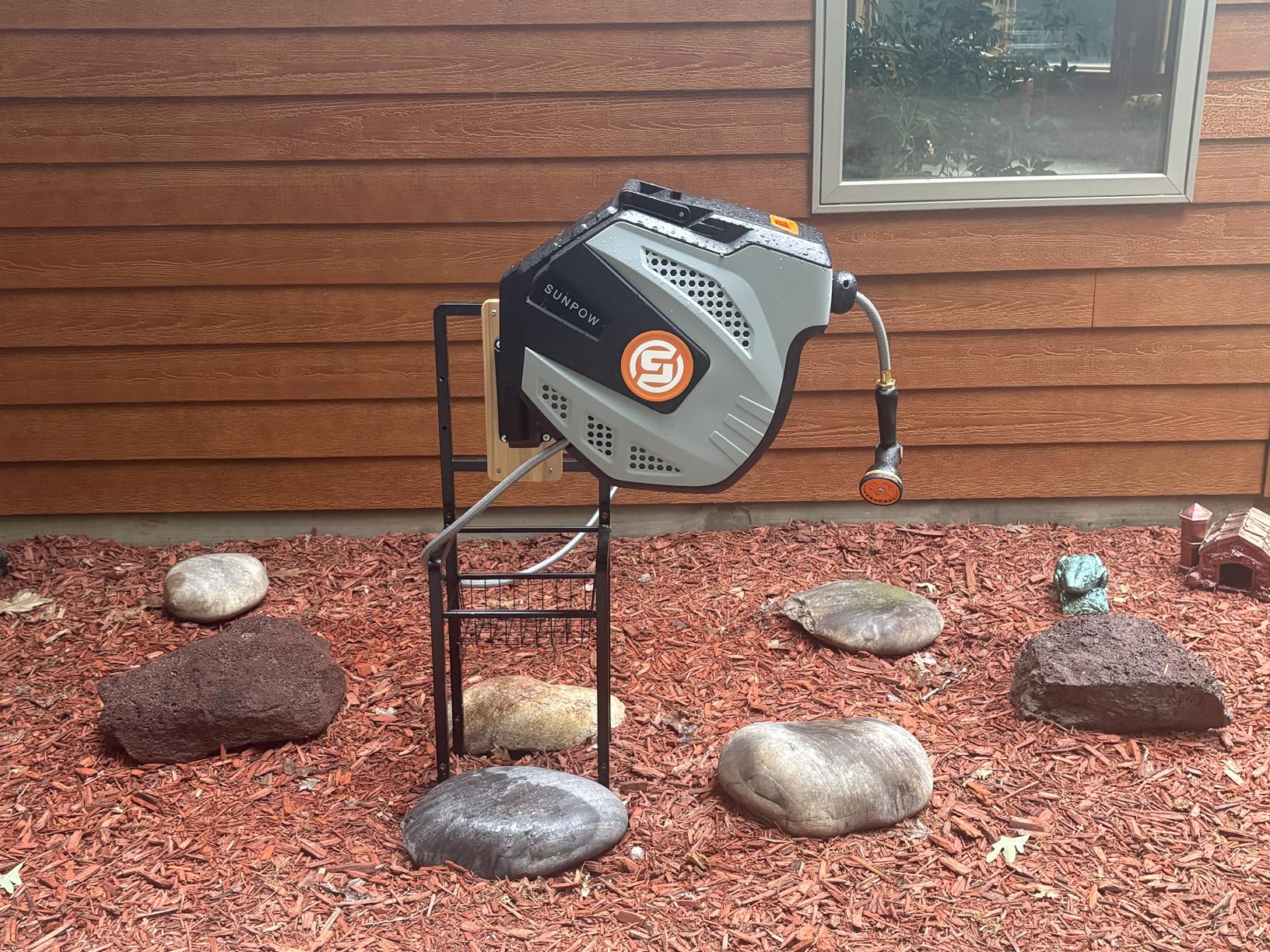 SUNPOW Retractable Garden Hose Reel - 1/2 inch x 50ft Heavy Duty Wall Mounted Hose Reel with 3/4 inch Brass Fitting & 10 Sprayer Nozzle - Any Length Lock, Auto Rewind System, 180 Degree Swivel Bracket- Grey customer photo 1