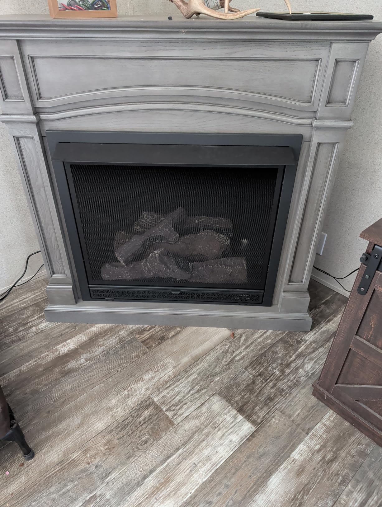 Comfort Glow Dual Fuel Ventless Gas Fireplace with Remote and Mantle The Montreal, Natural Gas or Liquid Propane, 33,000 BTU, Heats Up to 1,200 sq ft - Pewter Oak Finish customer photo 1