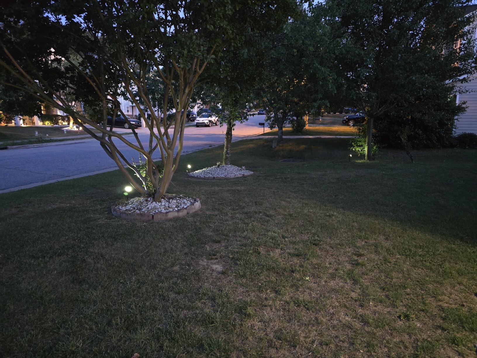 GKGG Solar Lights Outdoor Waterproof IP65, Solar Powered 76 LED 3 Lighting Modes Solar Spot Lights Outdoor for Yard Garden Landscape Pathway (Warm White, 4 Pack) customer photo 1