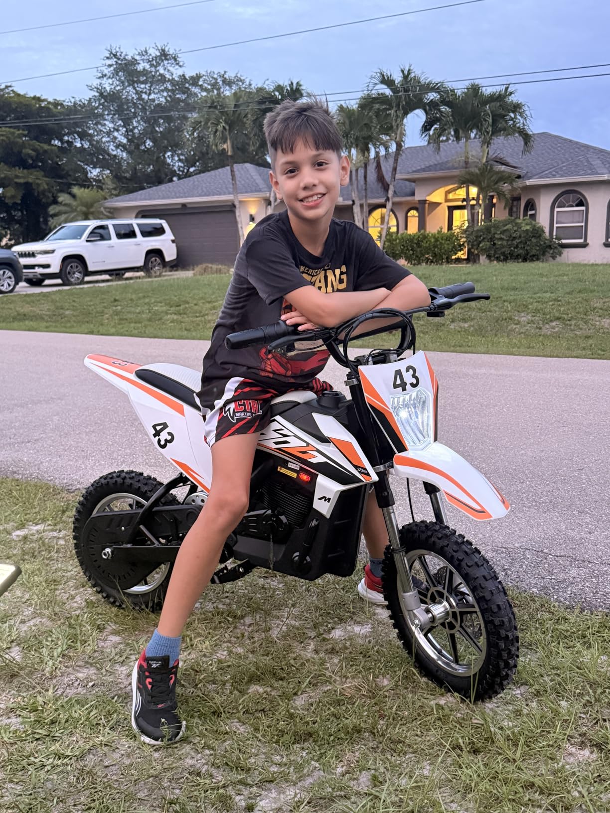 Blitzshark 36V 650W Kids Electric Dirt Bike, Off-Road Motocross Motorcycle with 17 MPH Max Speed, Dual Disc Brakes, Aluminum Wheels, Dual Suspension, Twist Grip Throttle, Rubber Tires, Leather Seat customer photo 1
