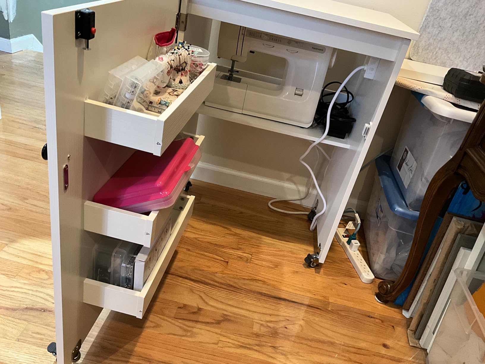 DORTALA Folding Sewing Table with Charging Station, Rolling Craft Station with 3 Storage Bins & Open Shelf, Mobile Sewing Machine Desk with Lockable Wheels for Home, Small Spaces (White) customer photo 1