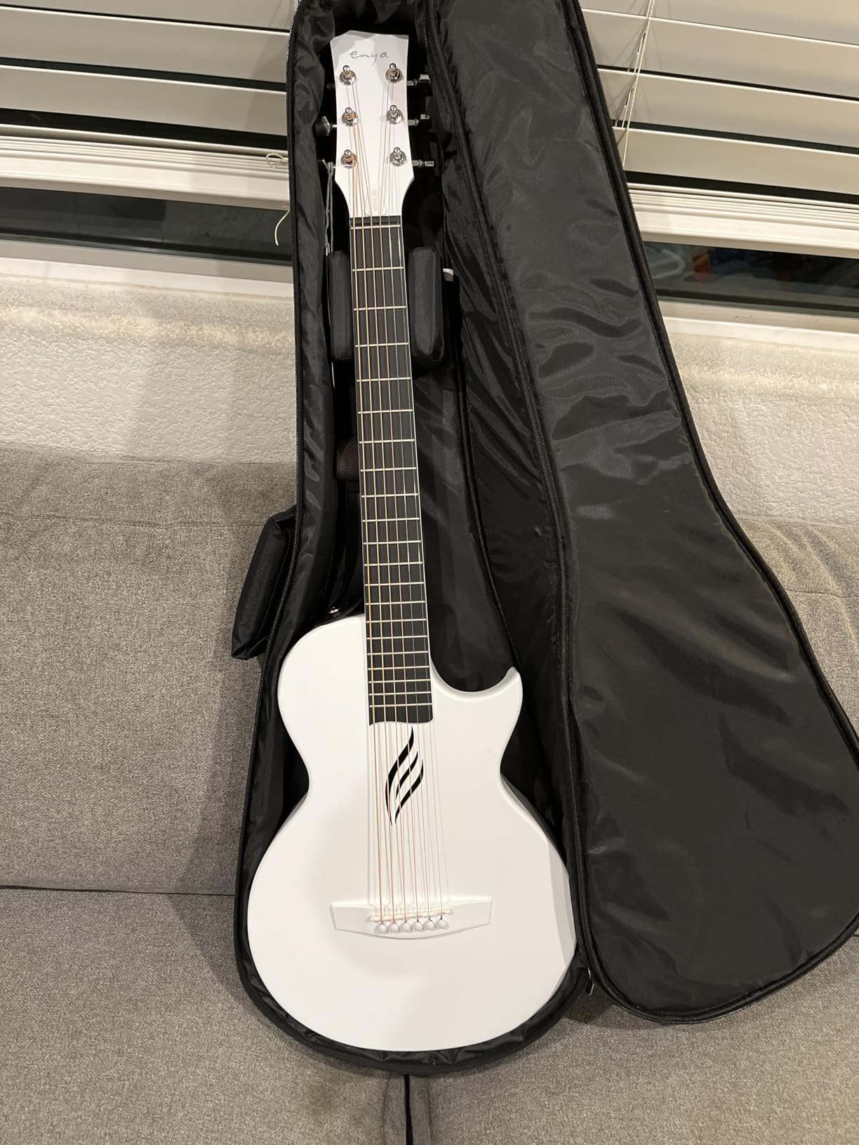 Enya Nova Go Carbon Fiber Travel Acoustic Guitar | 1/2 Size Lightweight Moisture-Proof Guitar | Adult & Beginner Portable Guitar with Gig Bag & Accessories (Black) customer photo 1