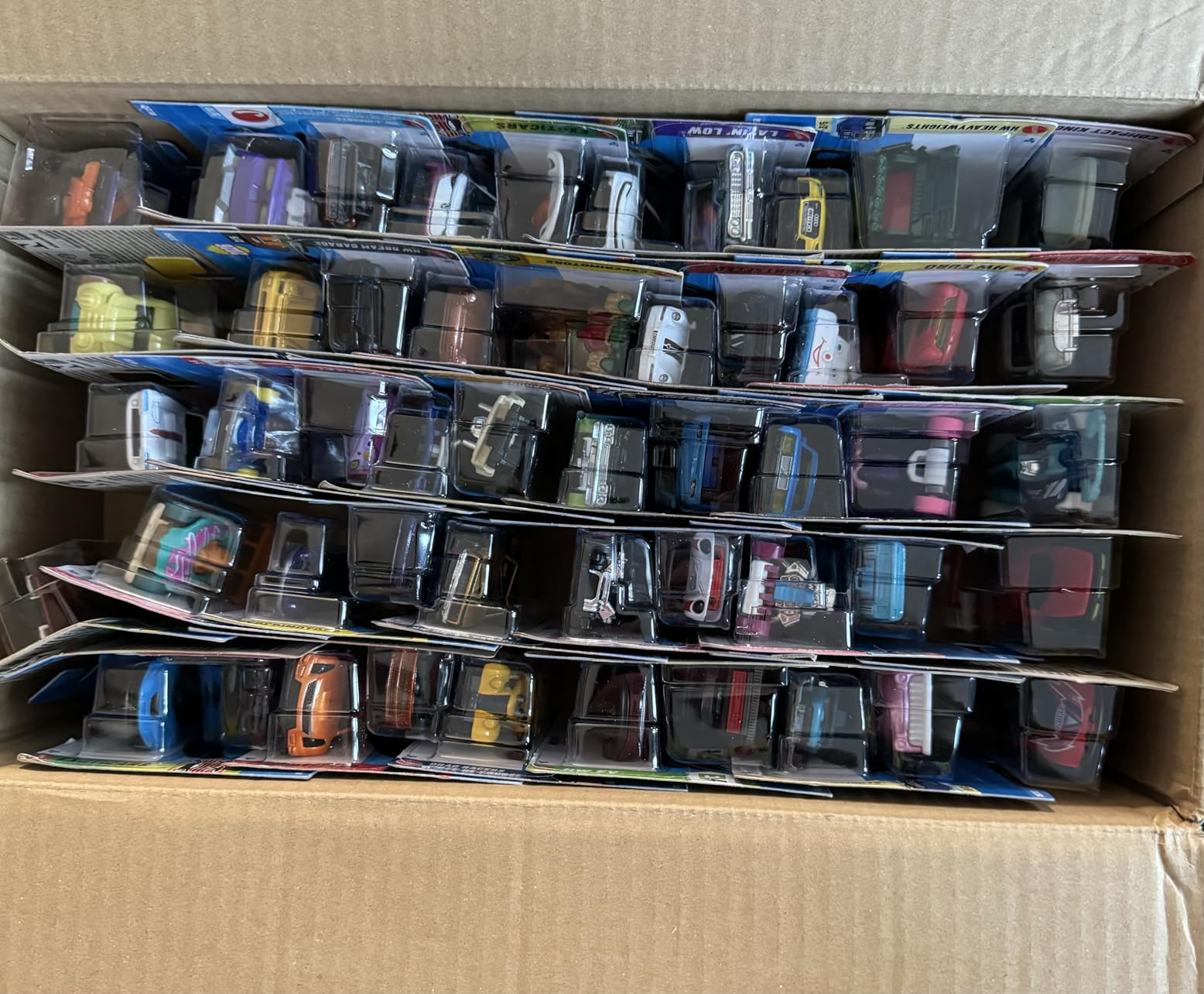 Hot Wheels Toy Cars & Trucks, 50-Pack of 1:64 Scale Vehicles, Individually Packaged (Styles May Vary) (Amazon Exclusive) customer photo 1