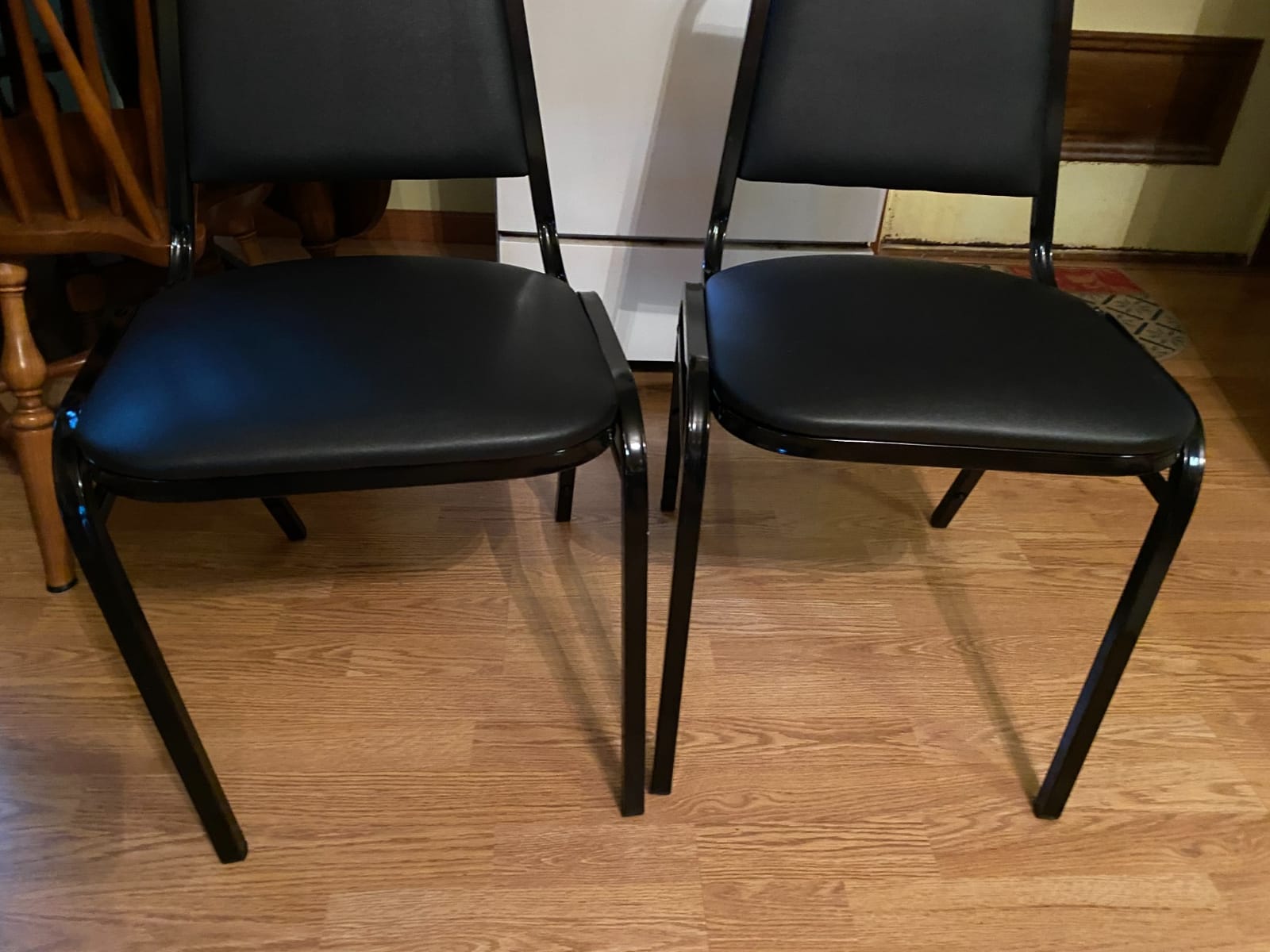 Flash Furniture Hercules Vinyl Banquet Chair, Black, 4-Pack | Stackable, Trapezoidal Back, Black Frame, Vinyl Upholstery customer photo 2