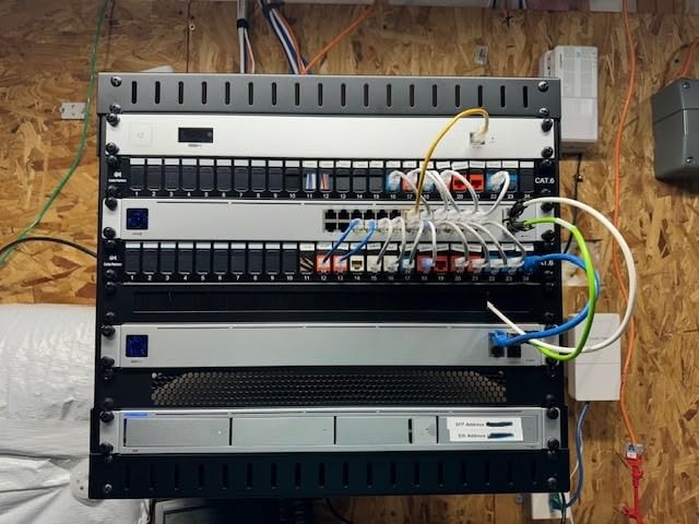 StarTech 15U 2-Post Wall Mount Open Frame Rack, 19in, 200lb (RK15WALLOA) | Adjustable depth 12-20in, SPCC cold-rolled steel, M6 cage nuts and screws, Heavy-duty 90kg capacity customer photo 2