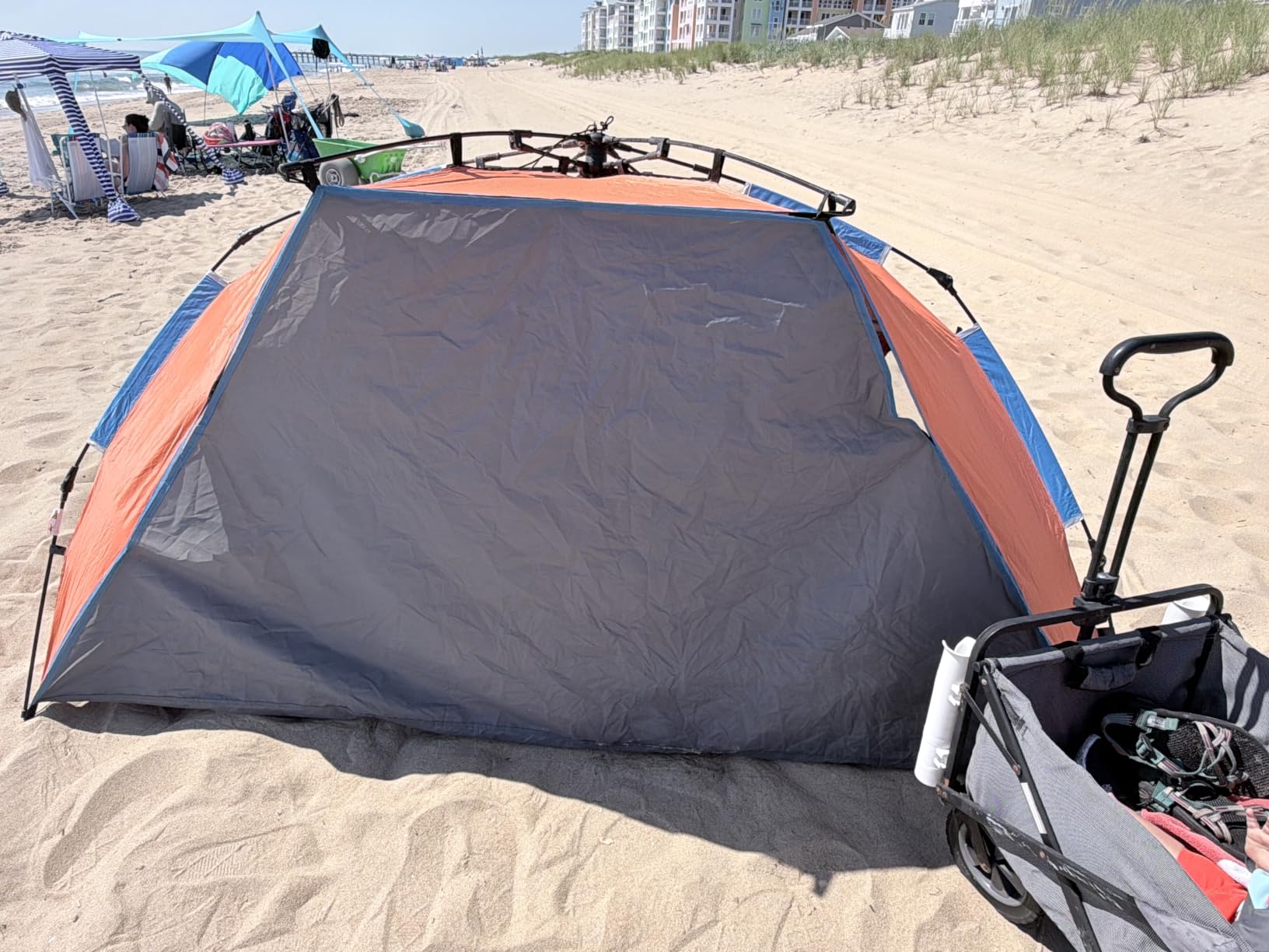 Oileus X-Large 4-Person UV Beach Tent with 6 Sand Pockets, Orange | Quick setup shade includes a carrying bag, stakes and weighted corners for windy days, fishing trips, hiking and camping. customer photo 1