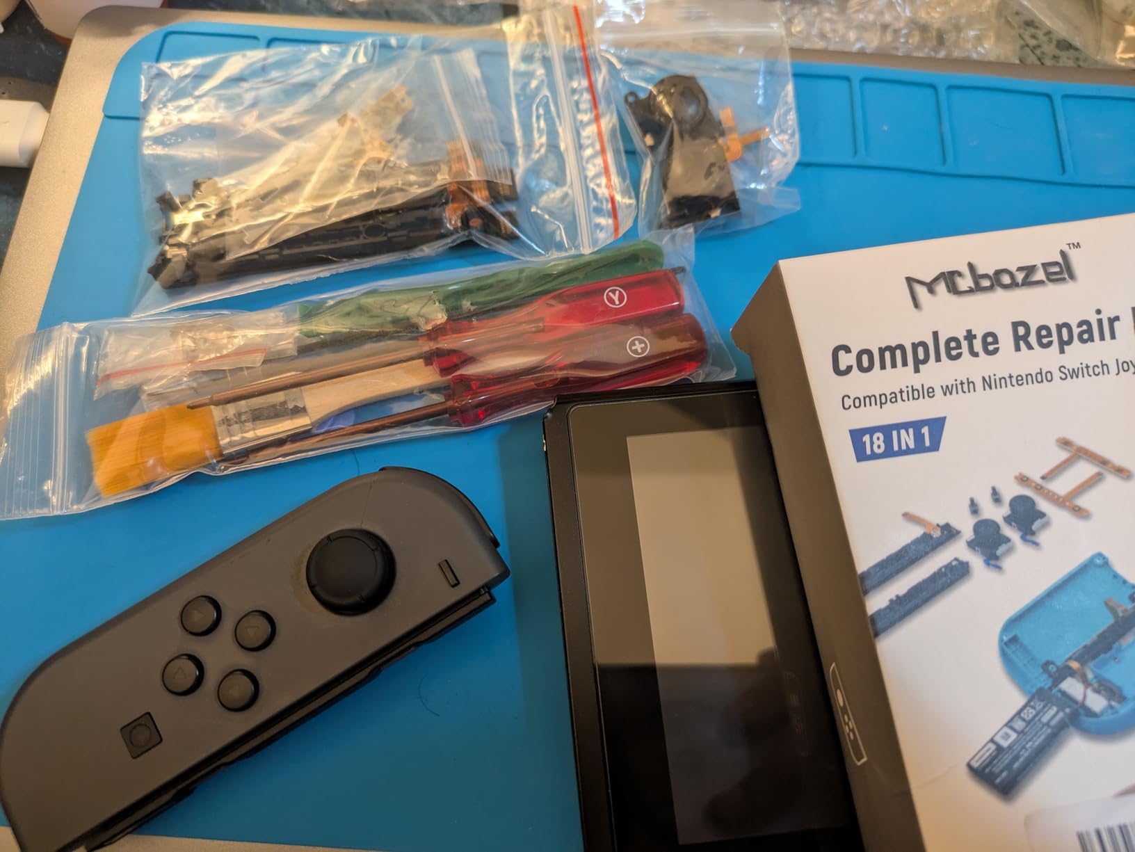 Mcbazel 18 in 1 Replacement Repair Kit for N-Switch Joy-Con with Screwdrivers Opening Tool, 3D Left Right Analog Joysticks, Buckle Lock, Charging Port Slider, Button Sync Flex Cable Set (NOT for Switch 2) customer photo 2