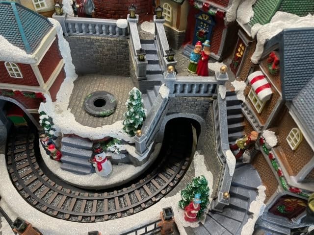 MOMENTS IN TIME Animated Christmas Village Scene with Rotating Train LED Lighted Houses Snow Covered Town Display Holiday Tabletop Decor with Christmas Tree and Figurines customer photo 2