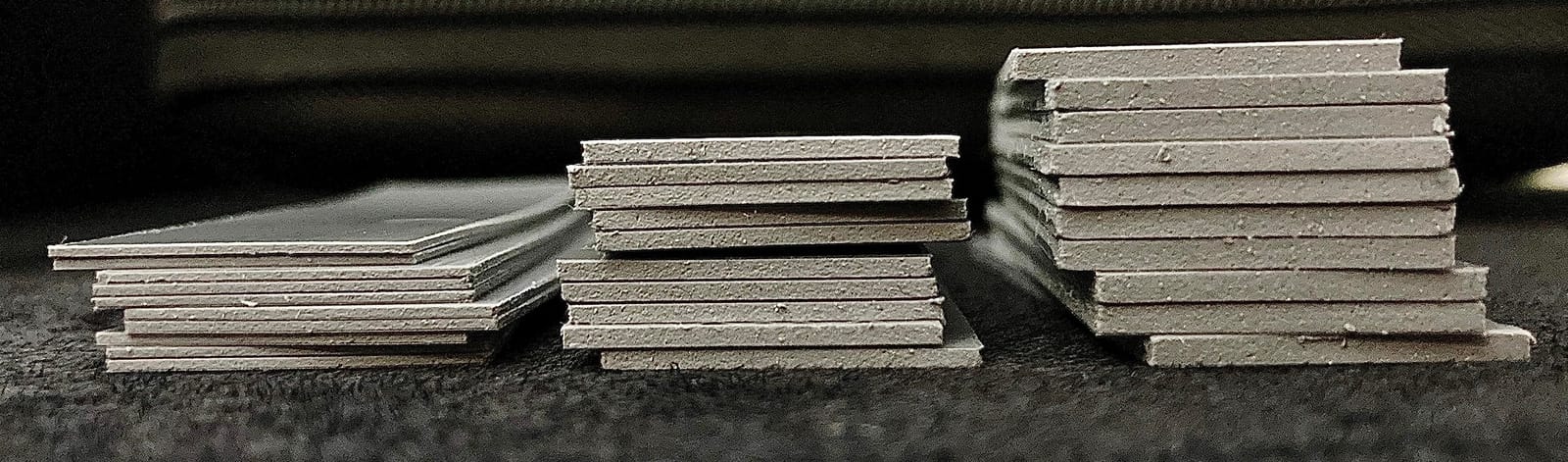 Outus 30 Pieces 2.6 x 0.8 x0.1 Inch Silicone Thermal Pad Reusable CPU SSD Thermal Conductive Silicone Pad Each Thick for Gpu Heatsink CPU Chip Heat Conduction or LED Heat Conduction(Dark Gray) customer photo 1